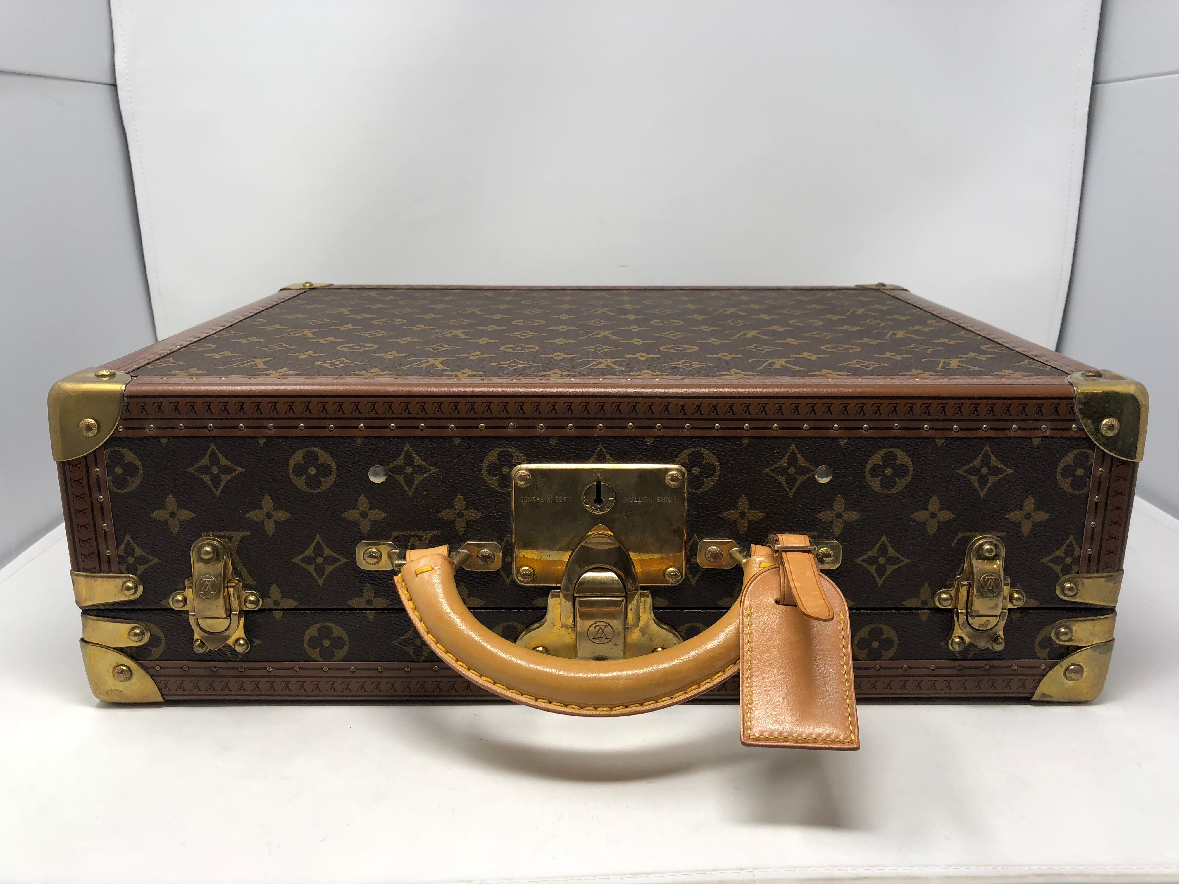 Louis Vuitton Cotteville 50 hard sided suitcase or briefcase. The little brother of the Alzer and Bisten, this case has generous room for all your essentials. Interior is like new and exterior has light wear. Great overall condition. This is a