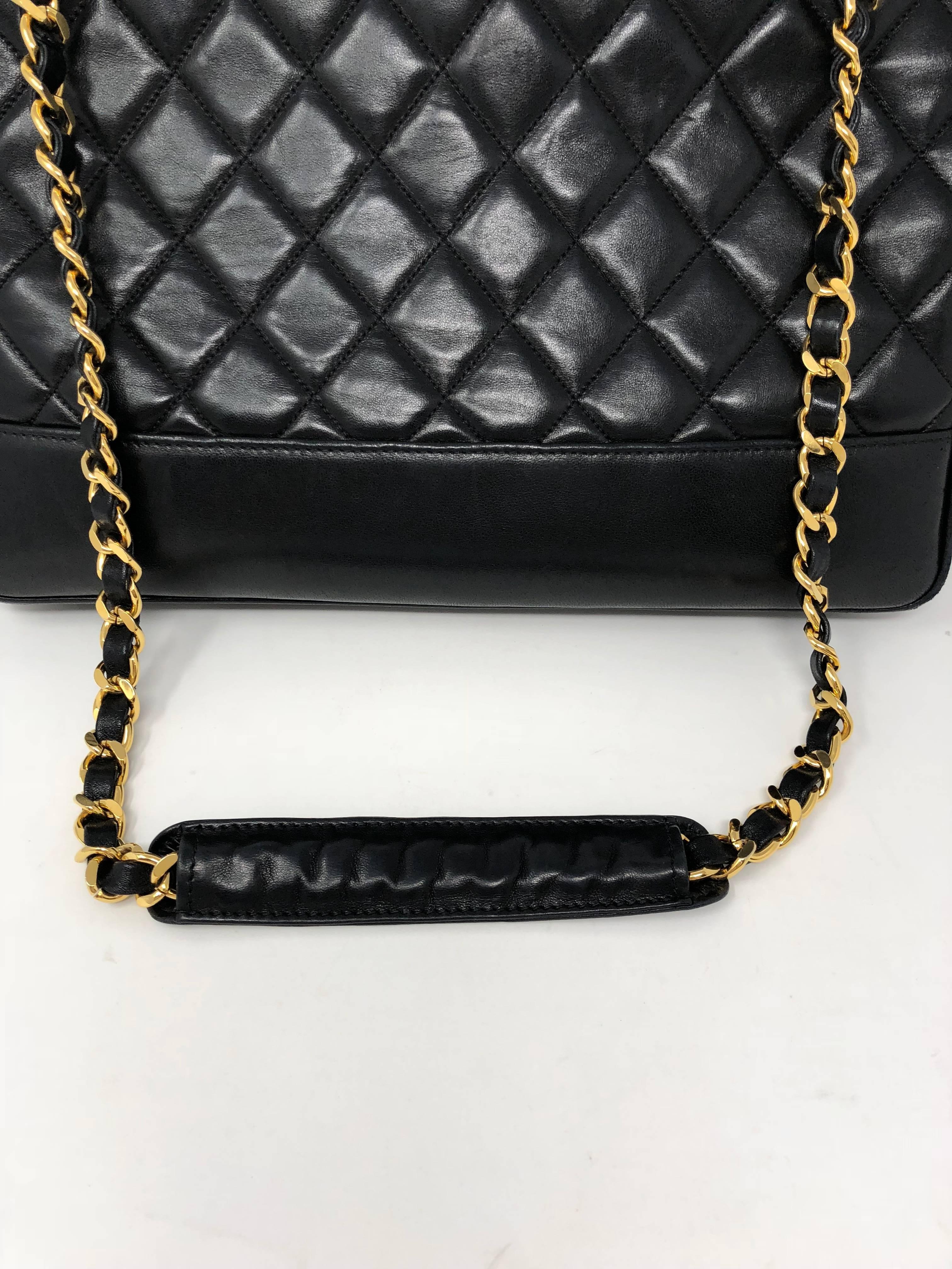 Vintage black lambskin leather tote style bag. Mint condition and gold hardware is still shiny. Buttery soft lambskin and from the 1990's. 