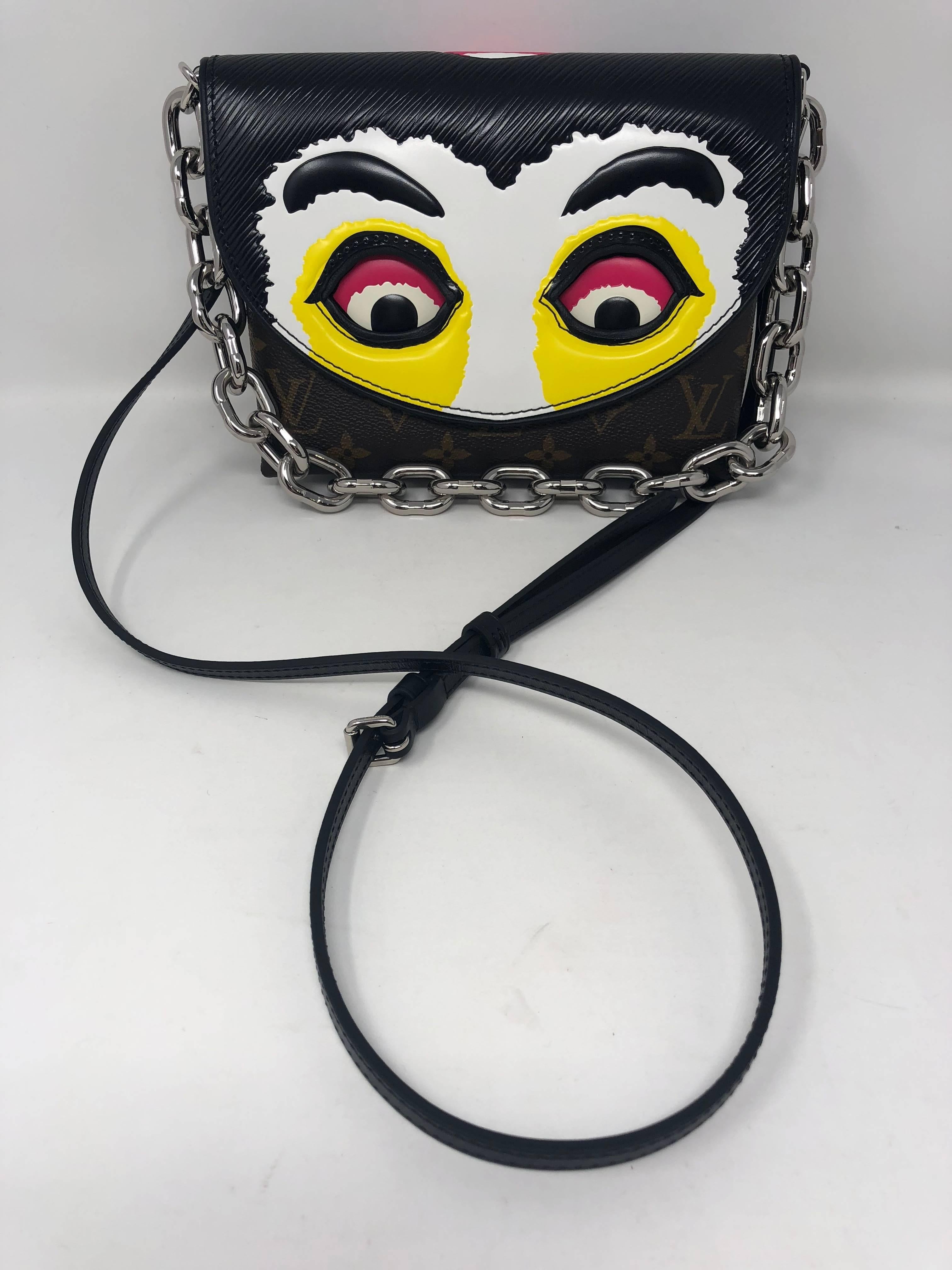 Louis Vuitton Kabuki-themed Cruise 2018 Collection Pochette with additional leather strap. Bag can be worn as a clutch or a crossbody. The Kabuki bag is modeled after Japanese traditional theatrical masks. They are art pieces as well as wearable.