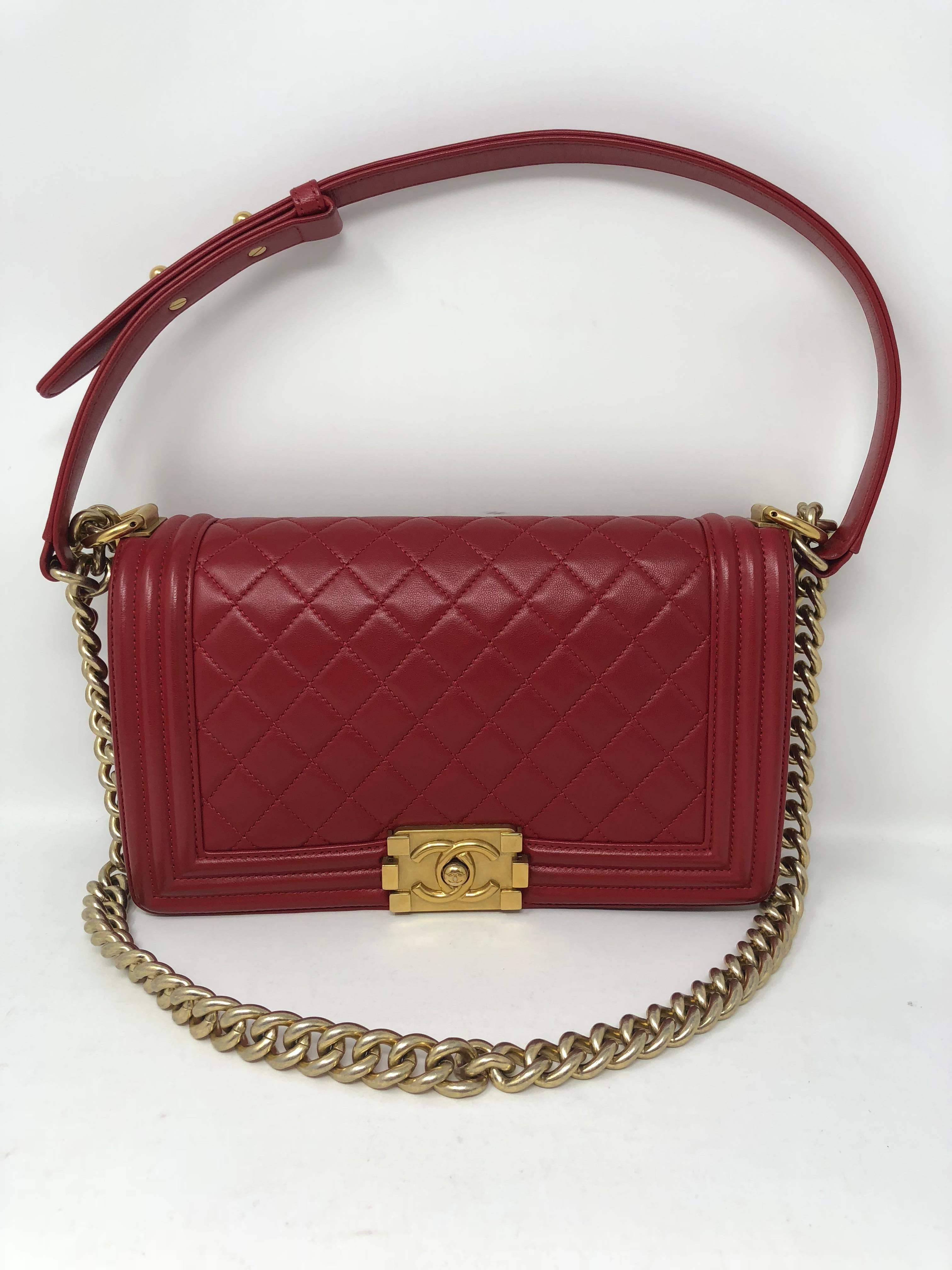 Chanel Le Boy Bag in red quilted lambskin leather with gold hardware. Great condition. From 2017 comes with authenticity card and serial number is inside tag. Guaranteed authentic. 