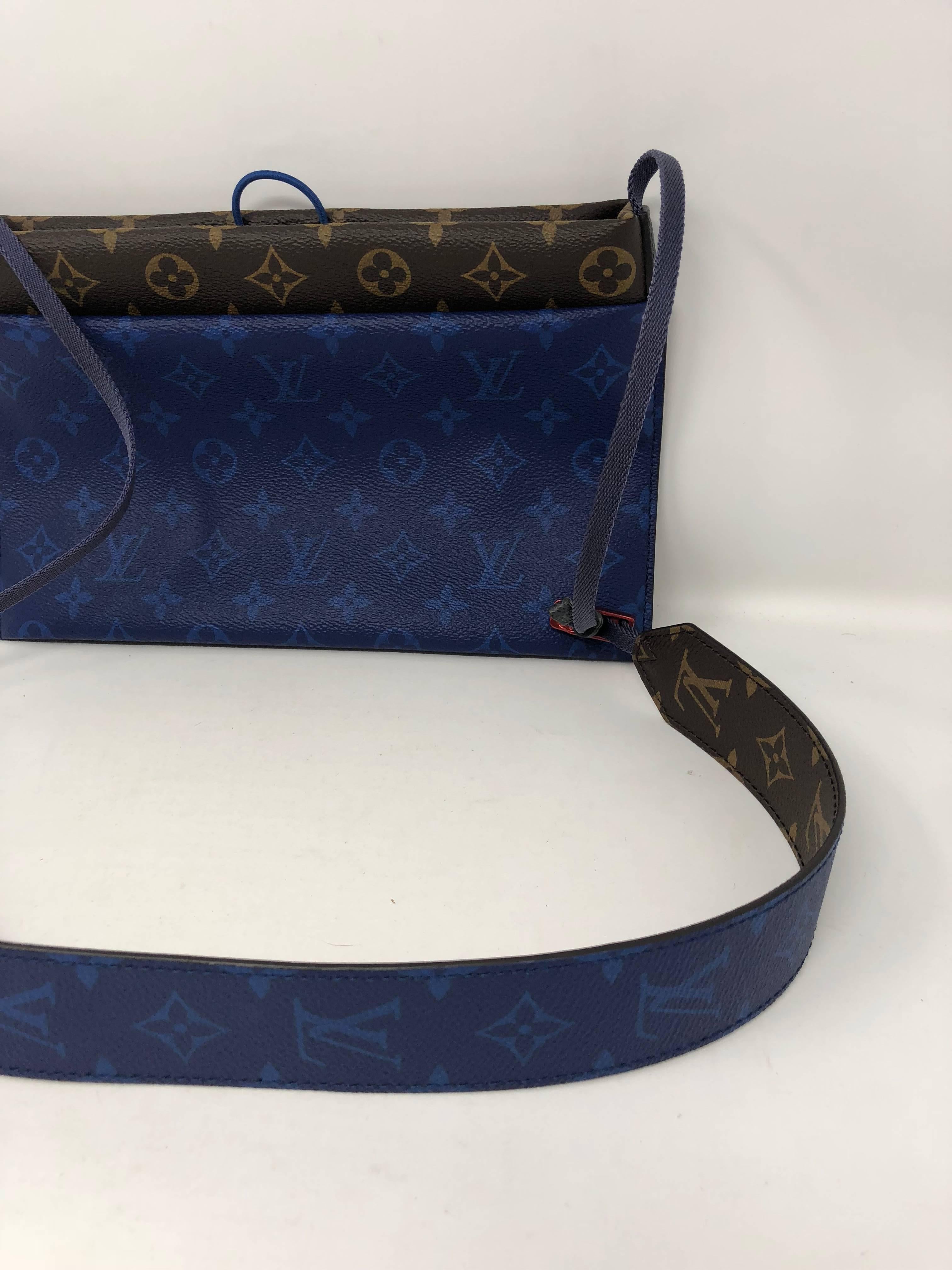 Louis Vuitton Pacific Monogram Small Outdoor Pouch is a travel or everyday crossbody.  The signature monogram canvas is mixed with blue and creates a sporty style from this 2018 outdoor collection. The pouch is versatile with any lifestyle. Sold out