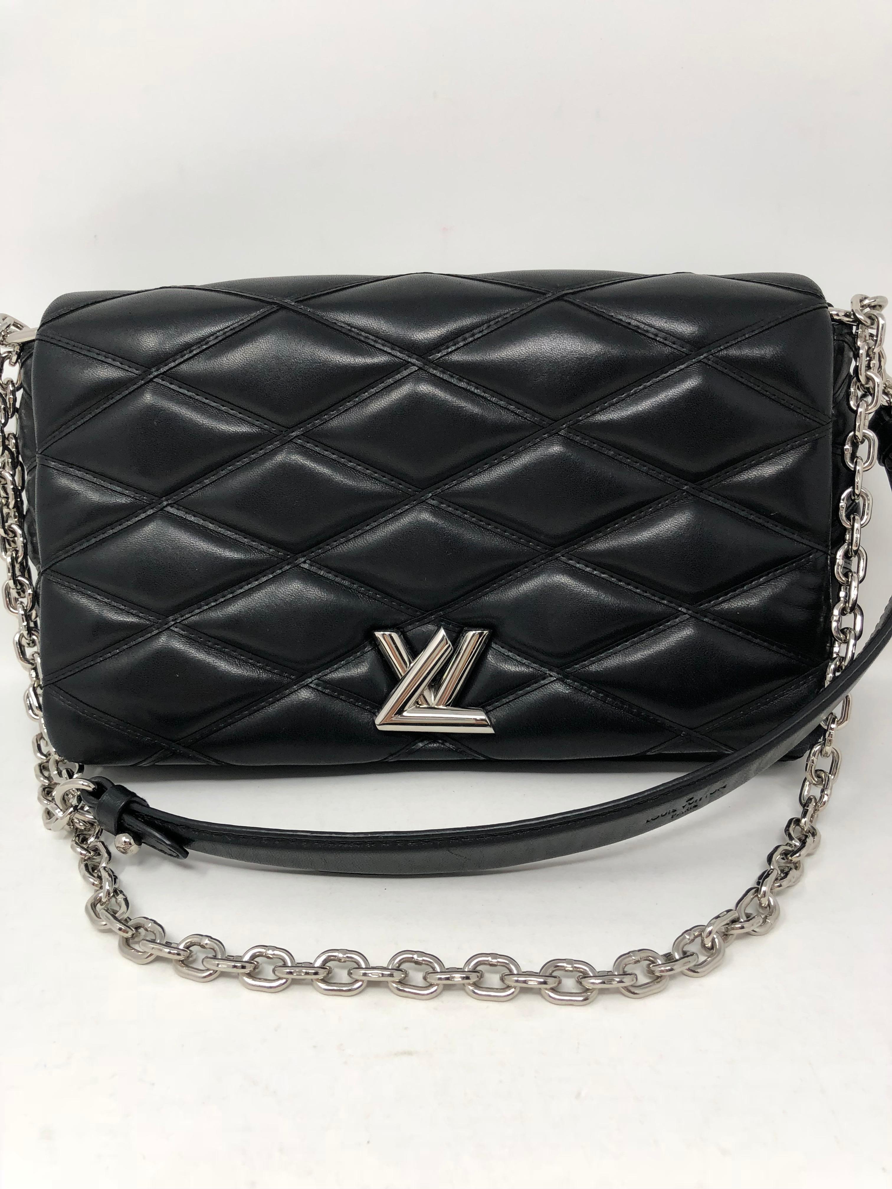 Louis Vuitton Lambskin Malletage GO-14 MM Noir Black Bag. Can be worn as a crossbody or doubled strap shoulder bag. The bag is crafted with soft criss cross embossed leather with a silver sliding chain link shoulder strap. Soft lambskin leather. The