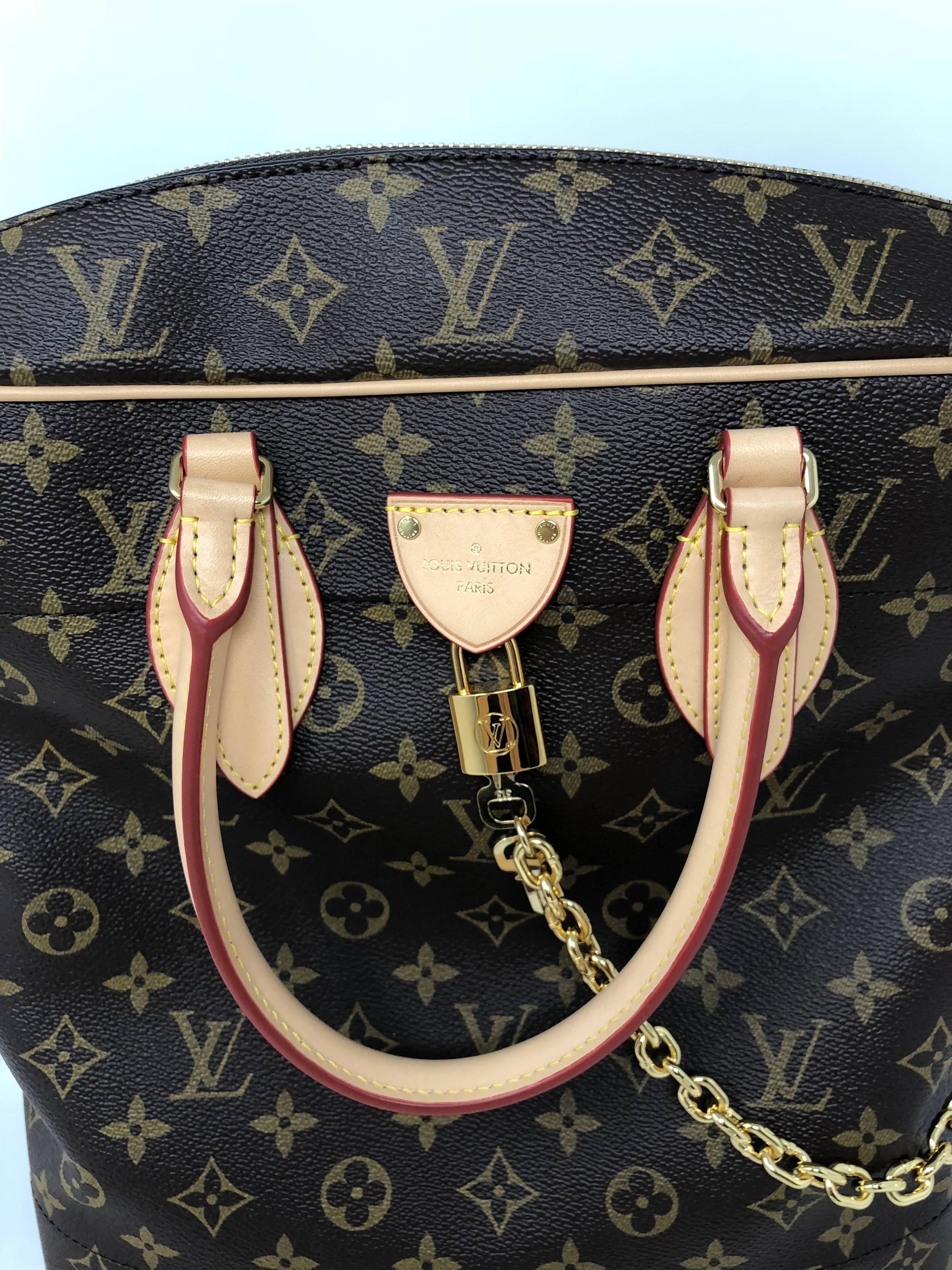 Louis Vuitton Carry All Monogram Shoulder Bag. Runway 2018 Collection. Sold out and hard to find. Limited edition inspired by the House travel heritage. Handles made with signature Toron leather handles and bag crafted with monogram canvas. The new