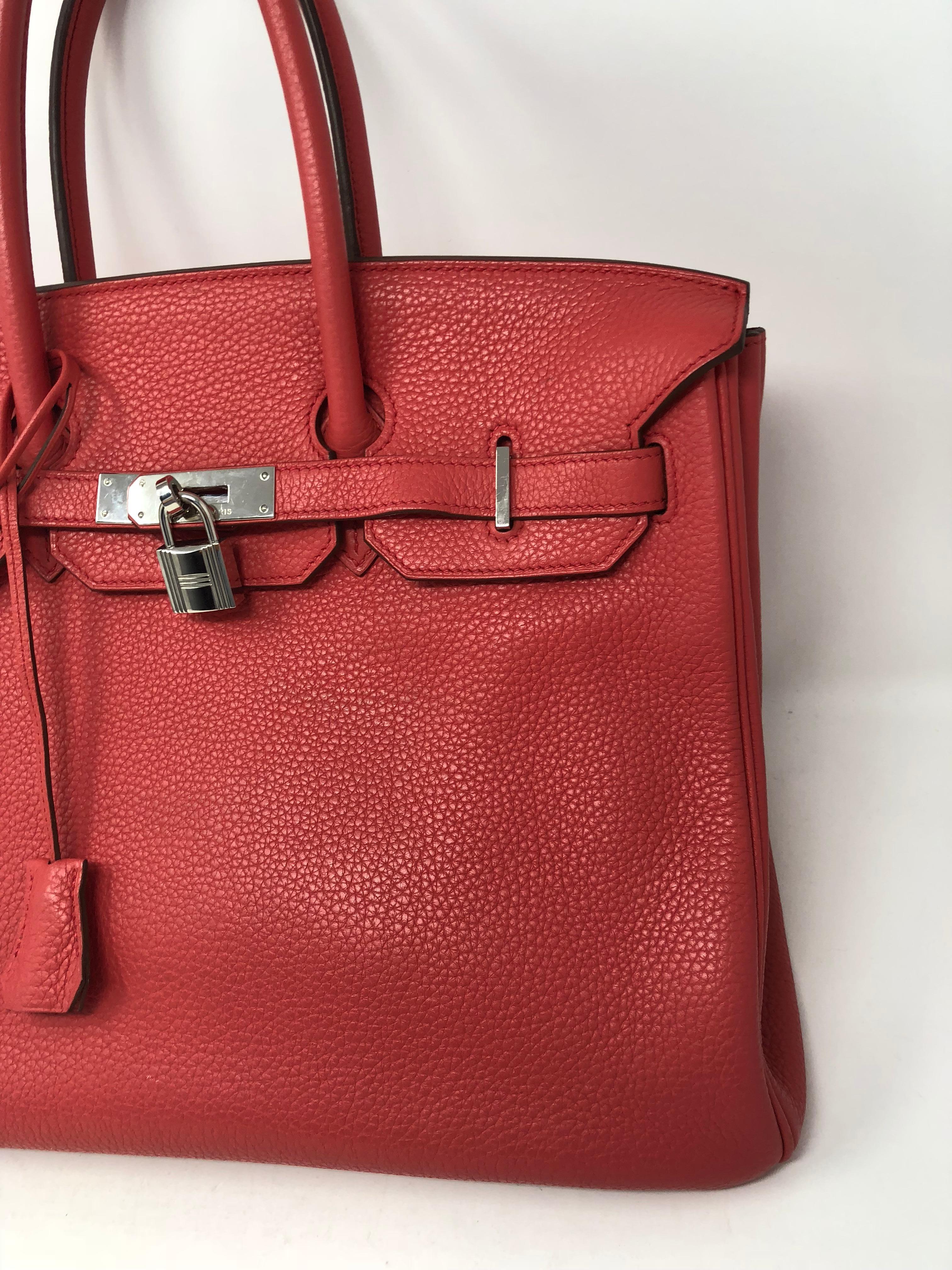 Hermes Birkin 35 in Bouganvillea Pink color togo leather. Palladium hardware and in excellent condition. Beautiful dark pink that will add a pop of color to any wardrobe. Rare color and perfect 35 size. Stamped M square from 2009. 
