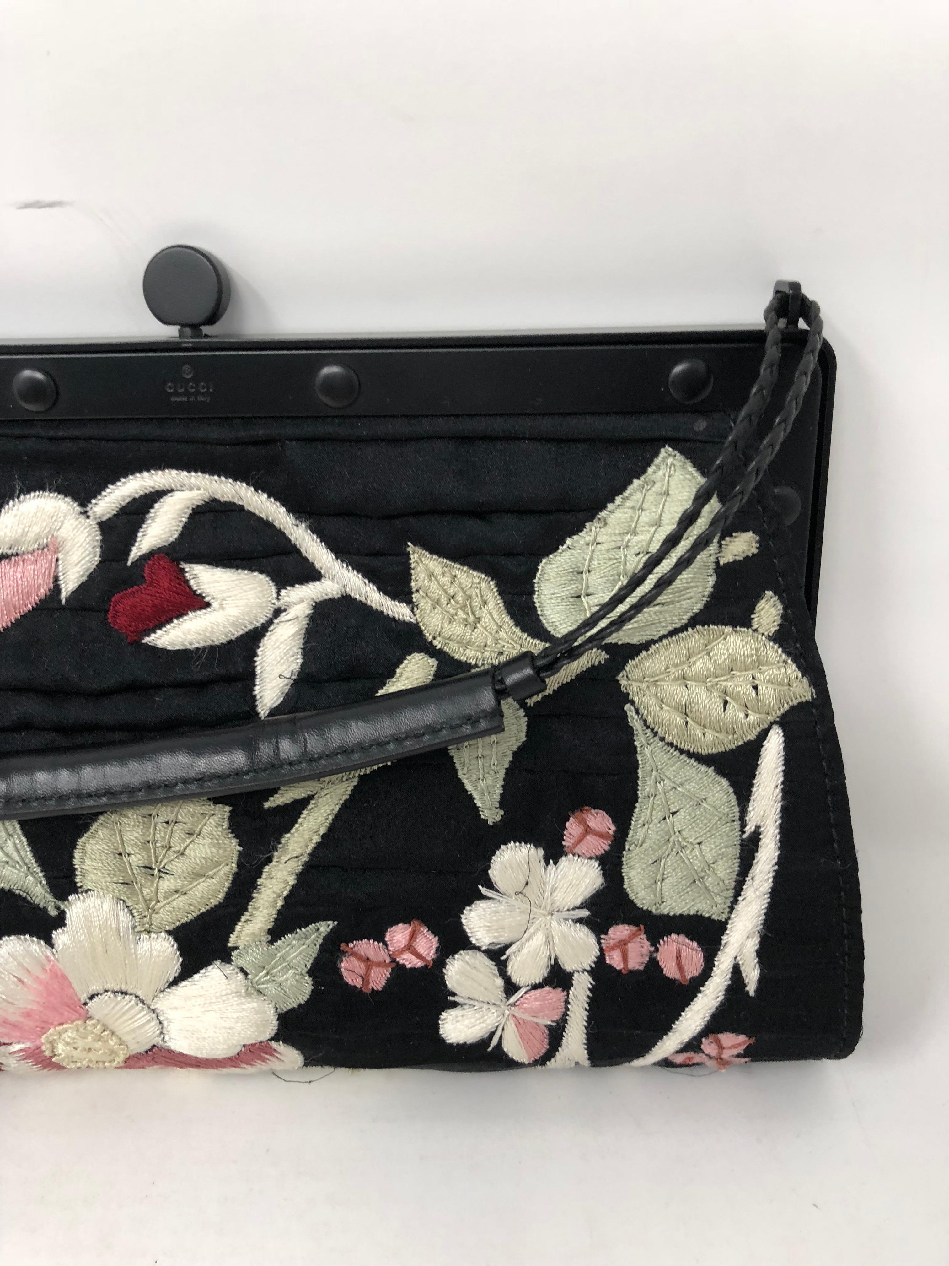Gucci Hand-stitched embroidered evening bag in black satin. Tom Ford designed for Gucci. Never worn in mint condition. Guaranteed authentic. 