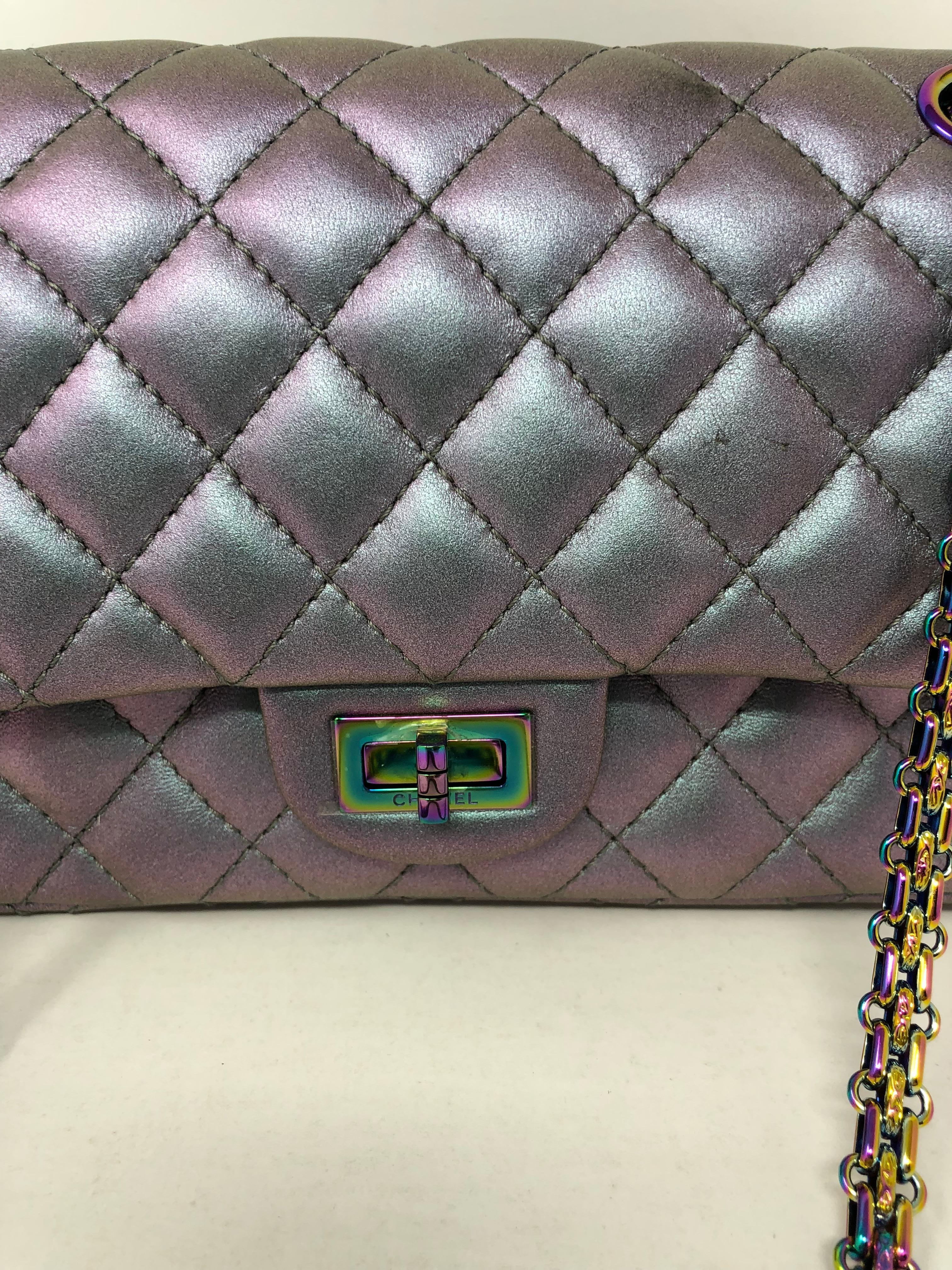 Chanel Iridescent Double Flap 2.55 Reissue Bag. Light Purple tones and metallic chain in Iridescent. Lambskin leather bag. Size is 226 and in the Reissue. Rare collector's piece. 
