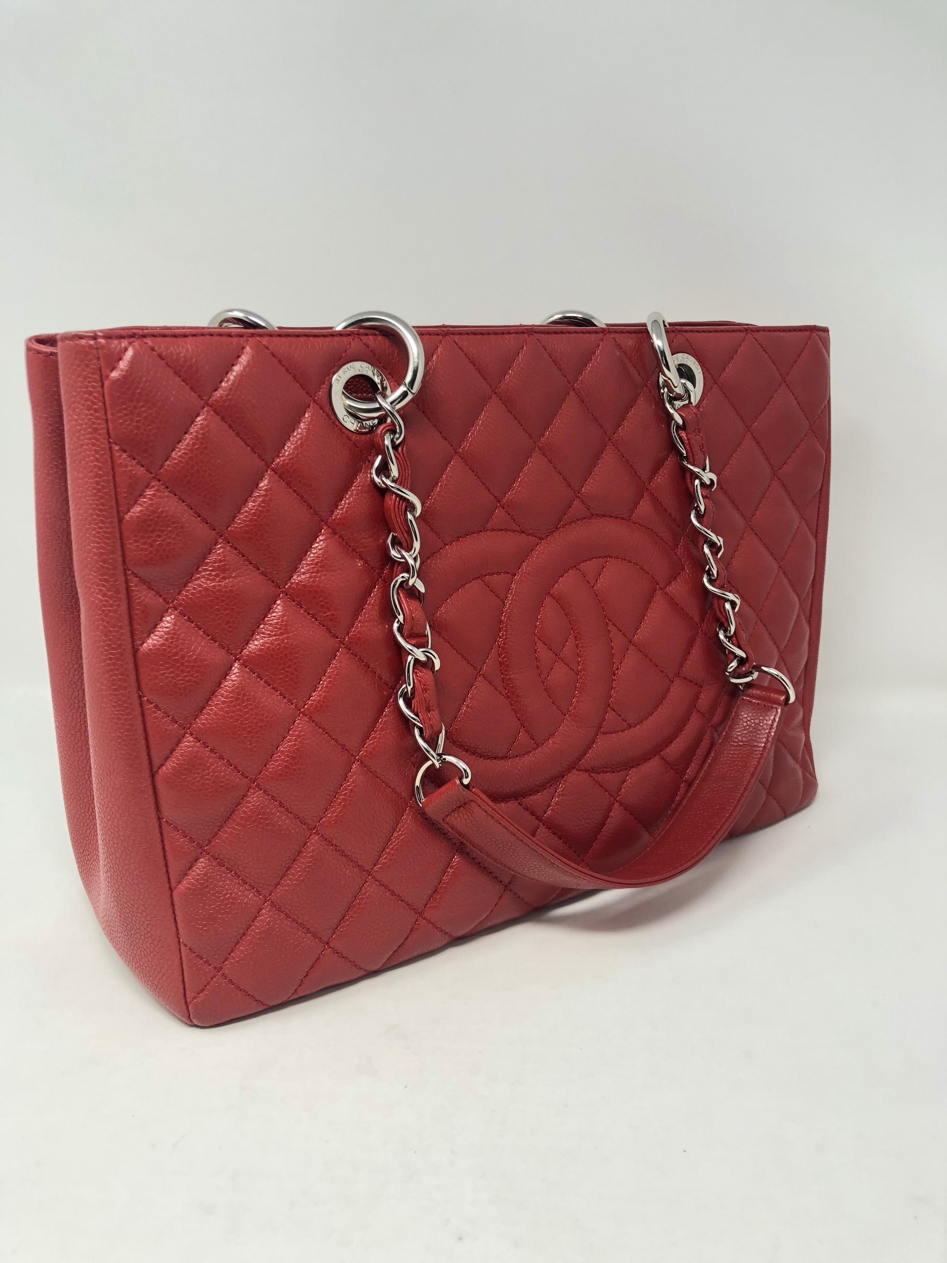 Chanel Red Caviar Leather GST Bag. Discountinued Grand Shopper Totes from Chanel are now highly collectible. This red color is hard to find. Silver hardware. Mint like new condition. Guaranteed authentic. 