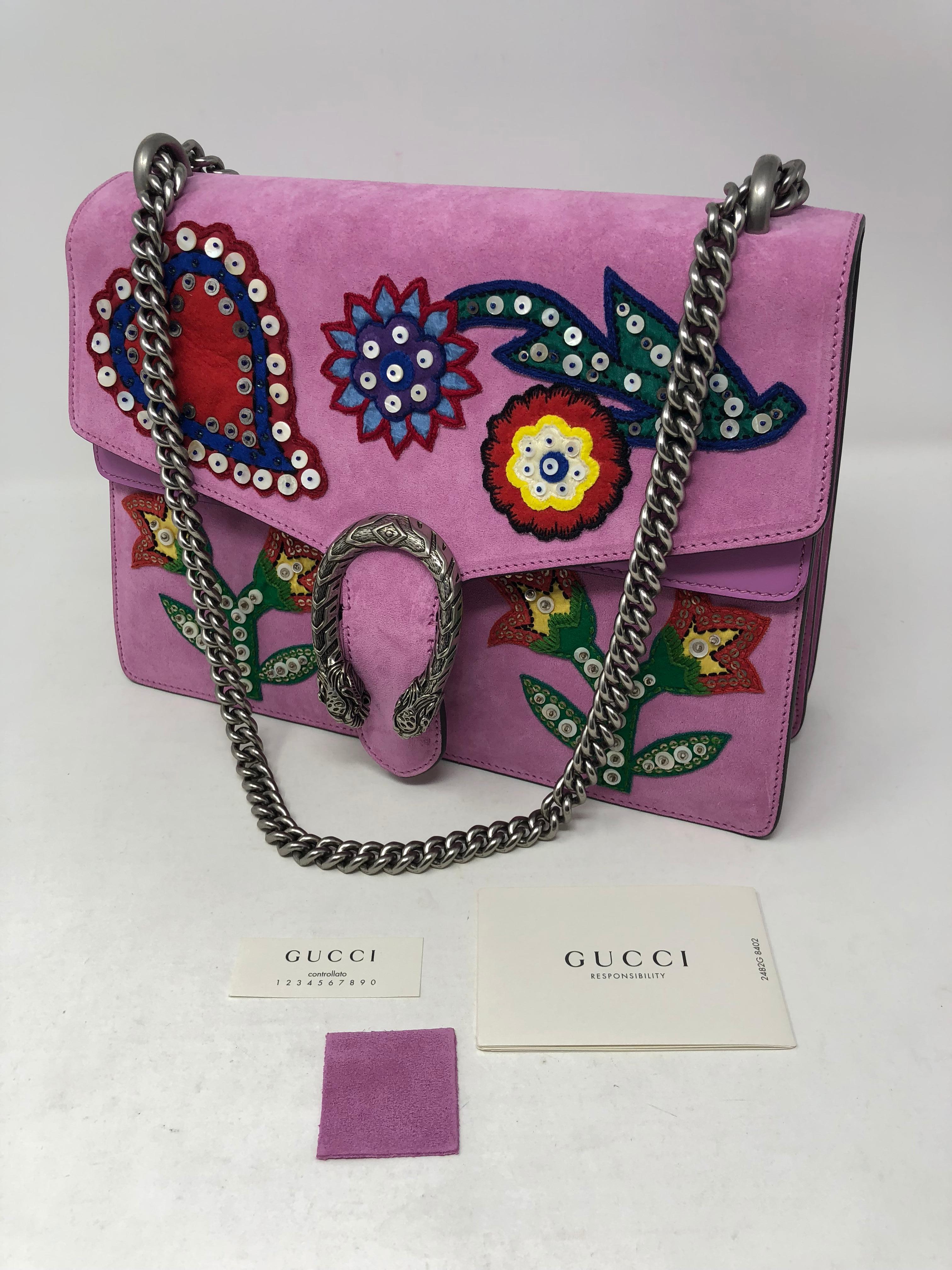 Gucci Dionysus Flower embroidered suede bag. Pink color suede bag with silver hardware. Brand new condition. Limited edition and 2 way bag. Sold out. Gucci shoulder bag with leather detail. Beaded heart and floral appliques. Sliding chain strap can