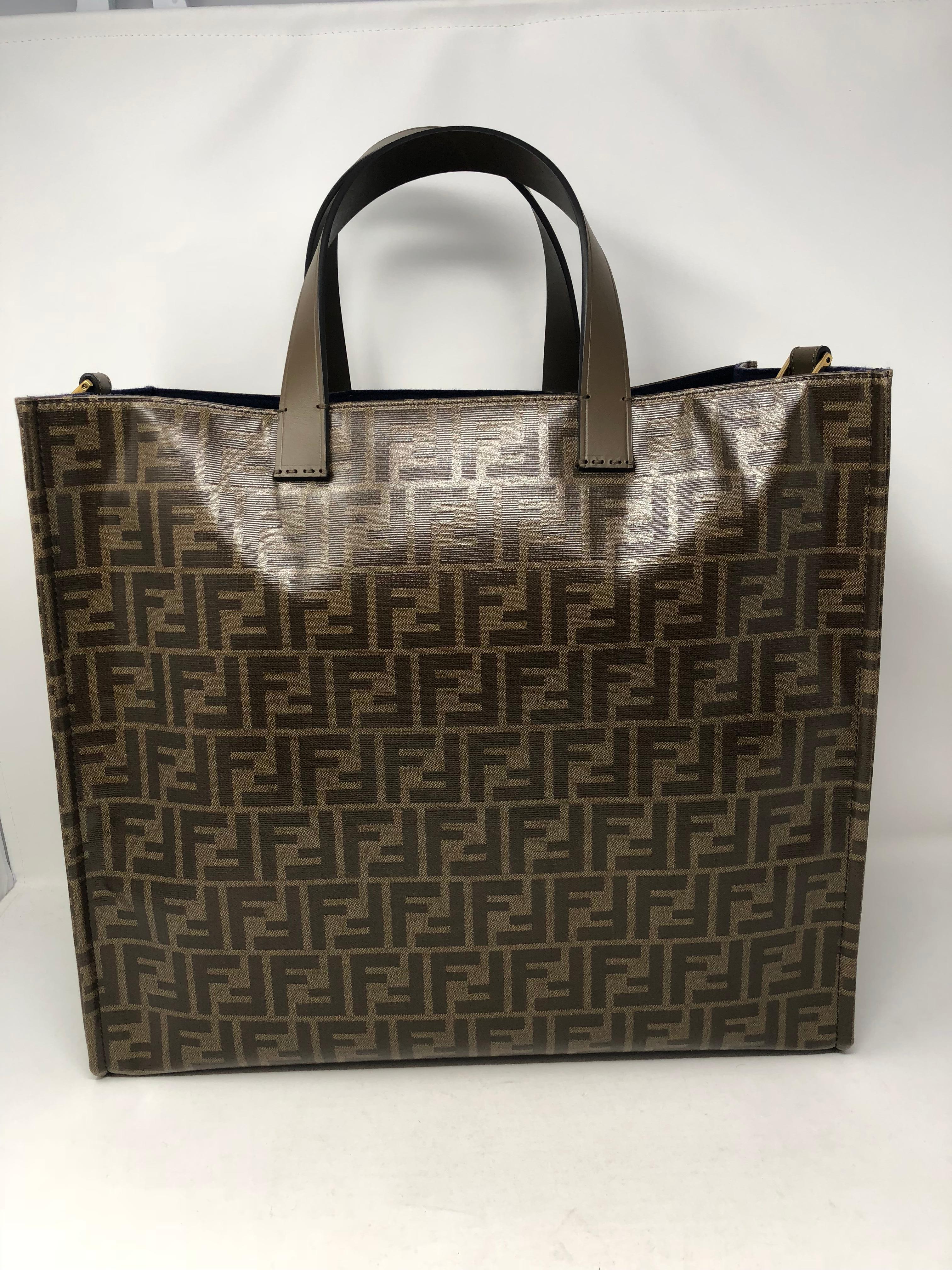 Fendi Runway Collection Large Tote bag in FF embossed canvas and leather. Fila and Fendi Collaboration makes this a very unique and limited item. Very roomy interior. Brand New and never used. This one is available now. Guaranteed authentic. 