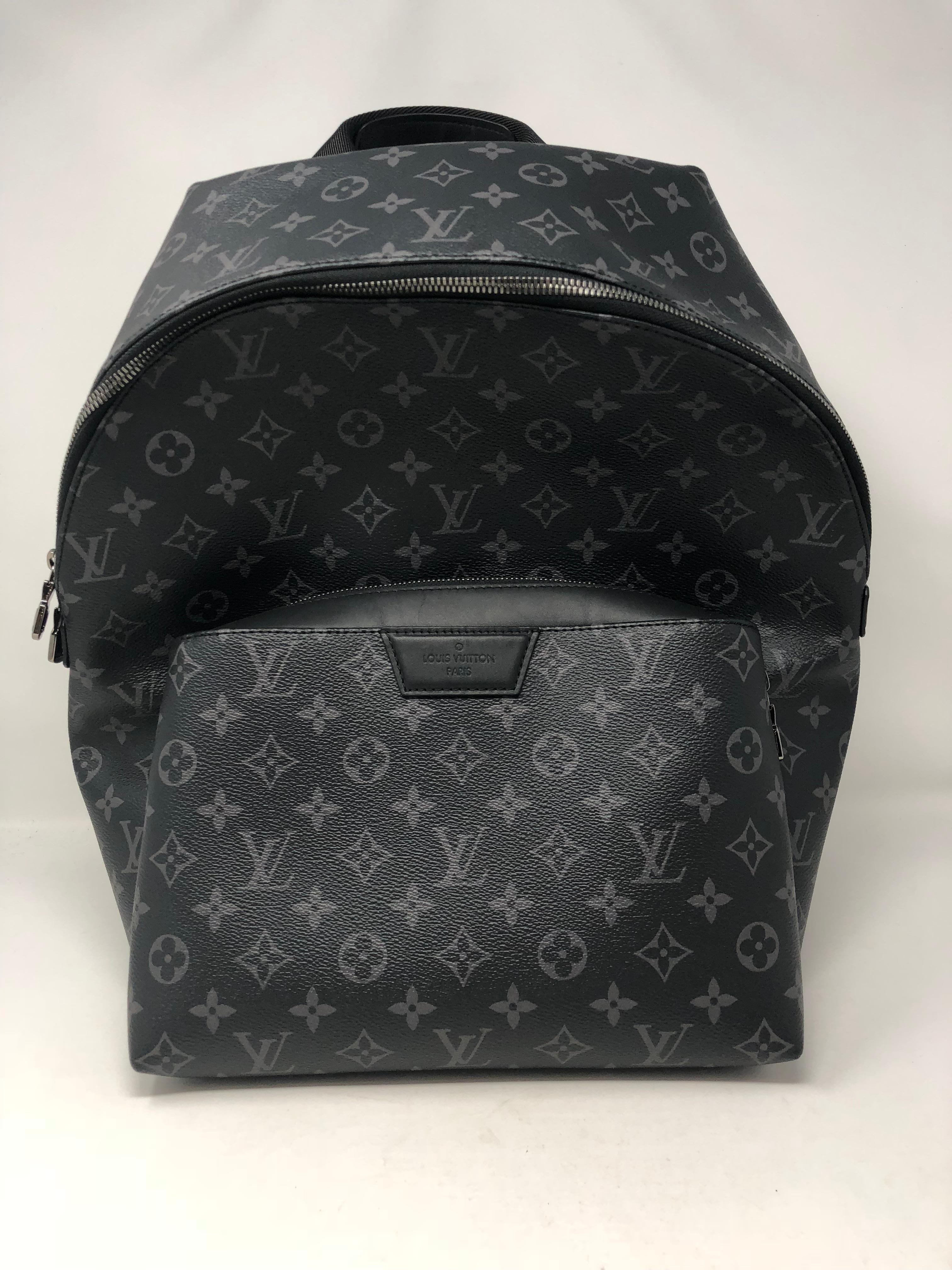 Louis Vuitton Monogram Eclipse Canvas Backpack. Brand new and sold out. Comfortable leather straps and nice size to fill all your goods. Front pocket with a magnetic closure. Comes with original dust cover and box.