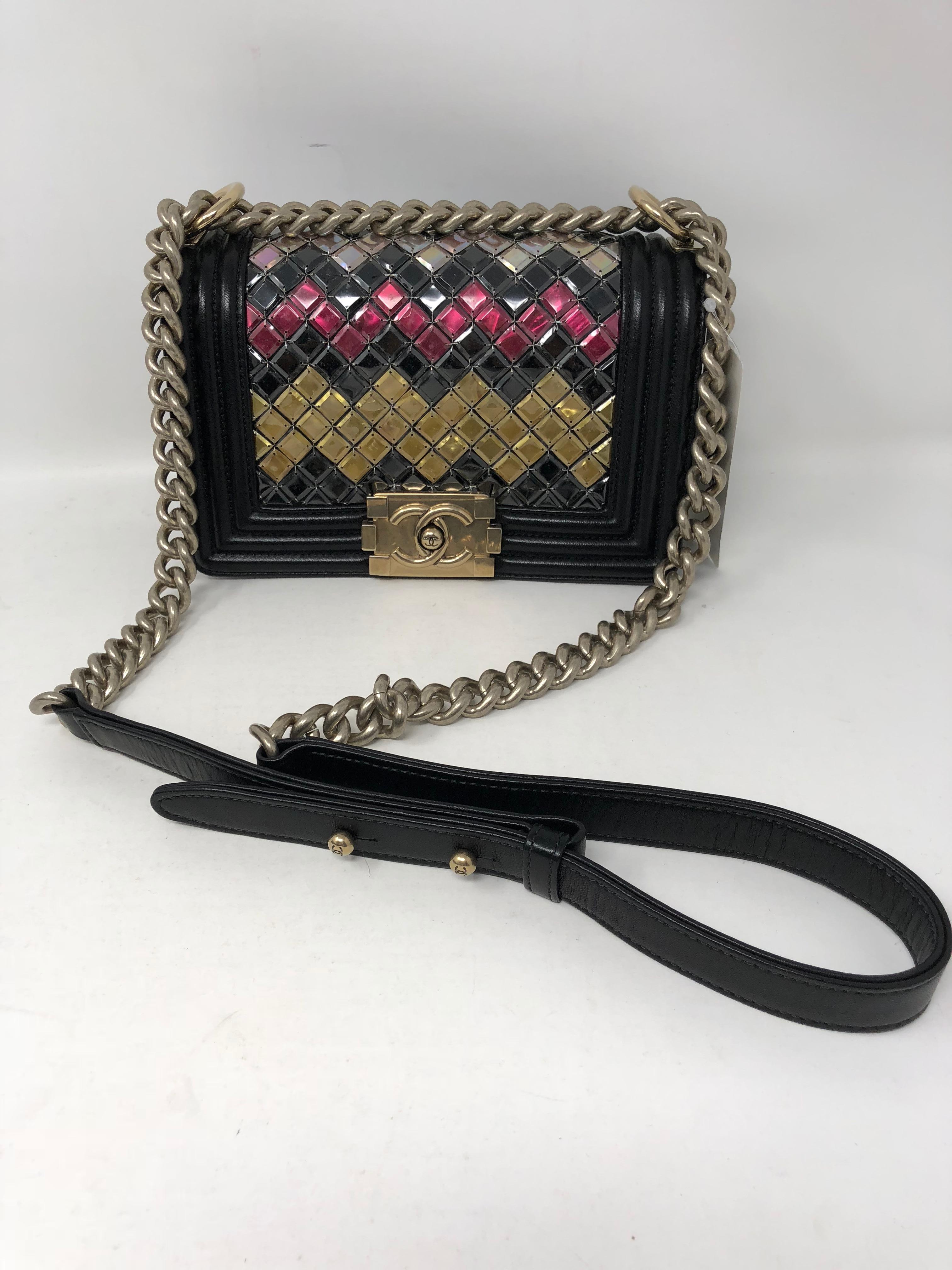 Chanel Black/ multi color sequins Boy bag. Antiqued gold hardware. Limited and rare Boy Bag. Small size Boy with adjustable strap. Unique patterning throughout the bag. Looks snakeskin like but is made with irredescent sequins hand woven with metal.