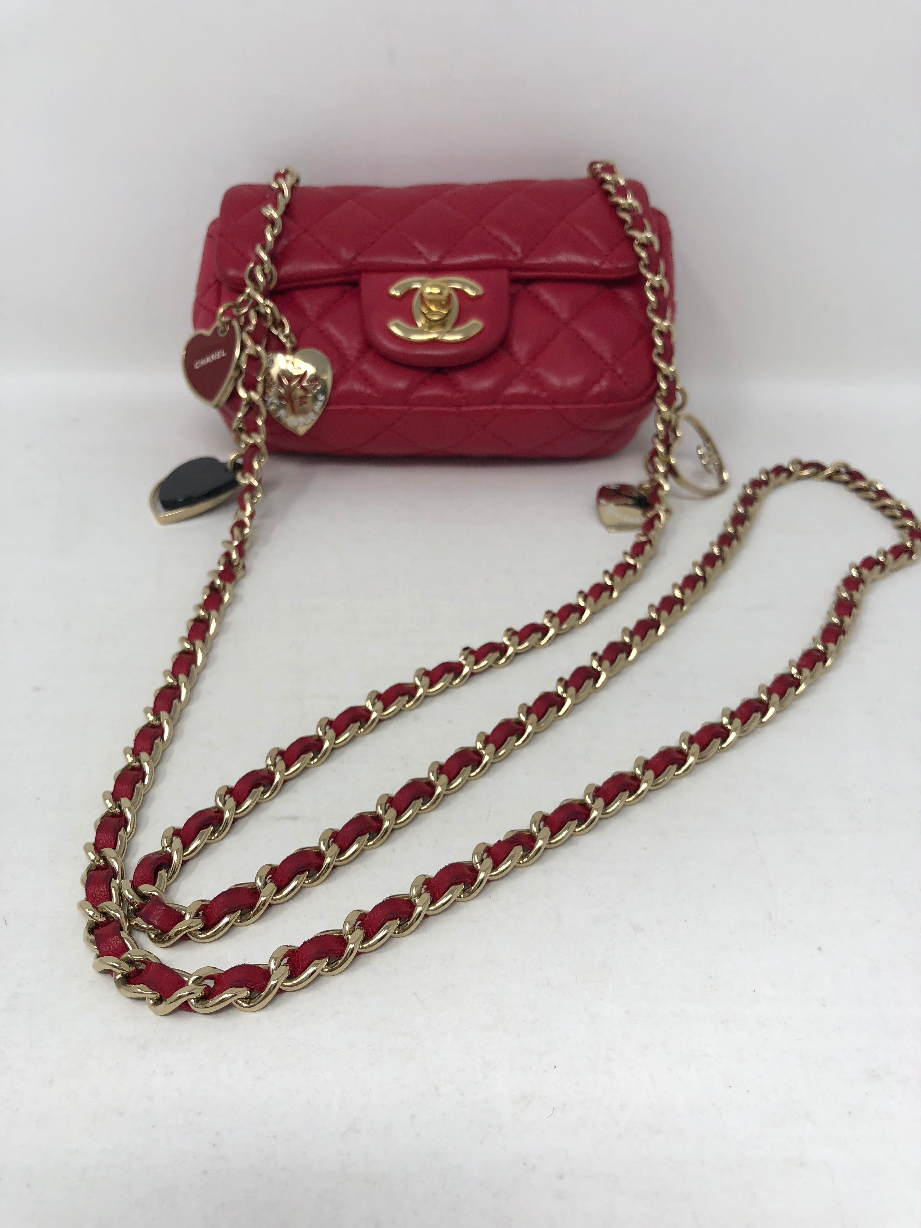 Chanel Extra Mini Crossbody with Chanel charms. Hearts on gold hardware. Whimsical cute bag can be worn crossbody. Good condition. Limited collection. Tiny enough to be worn to Football games. Own this sweet Chanel. Guaranteed authentic. 