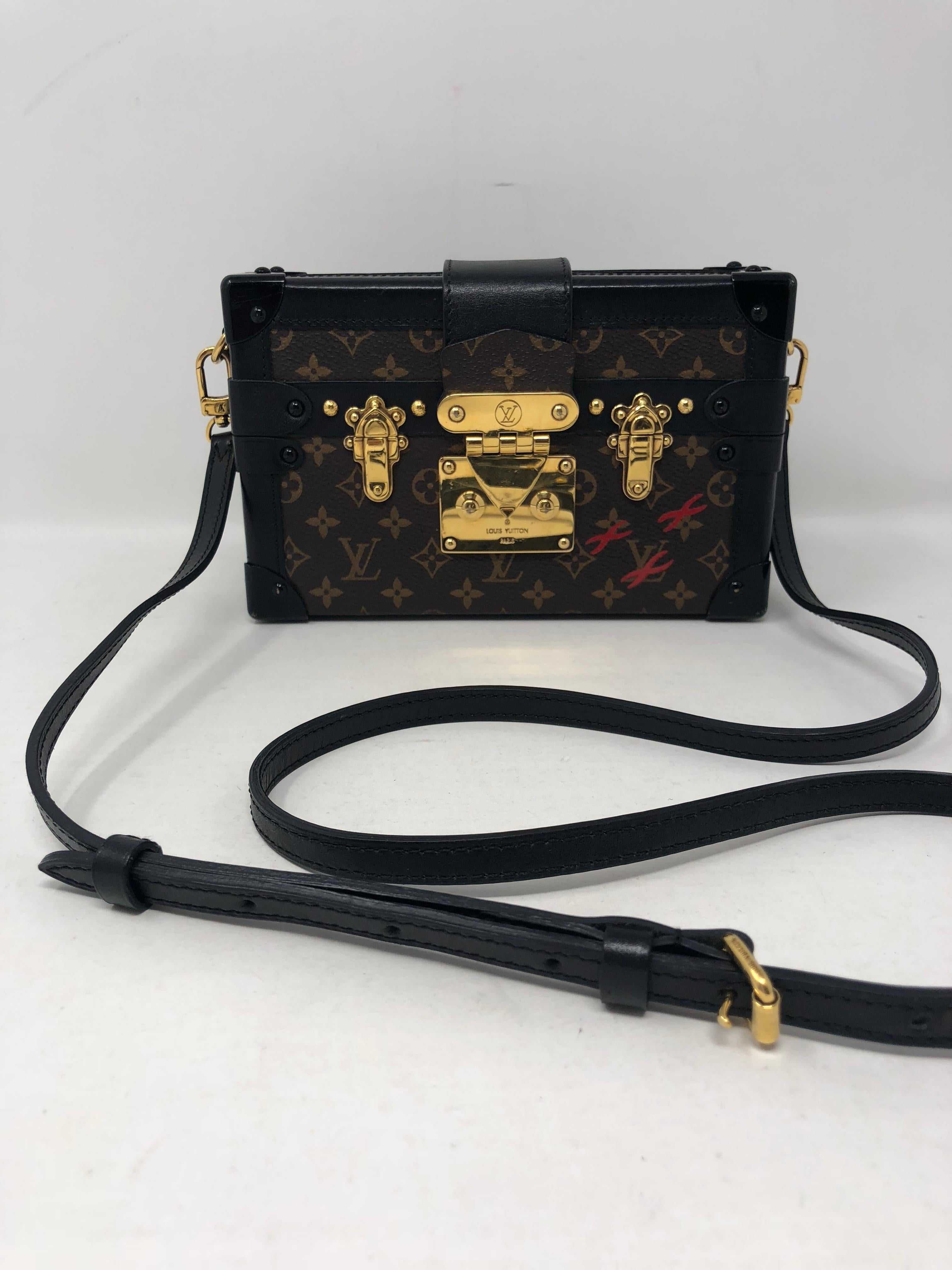 Louis Vuitton Petite Malle Mongram is sold out and limited. This is a gorgeous show piece. Has a little wear only on inside with a small pink mark. This timeless piece modeled after the House's trunks is one to keep in your collection. The strap can