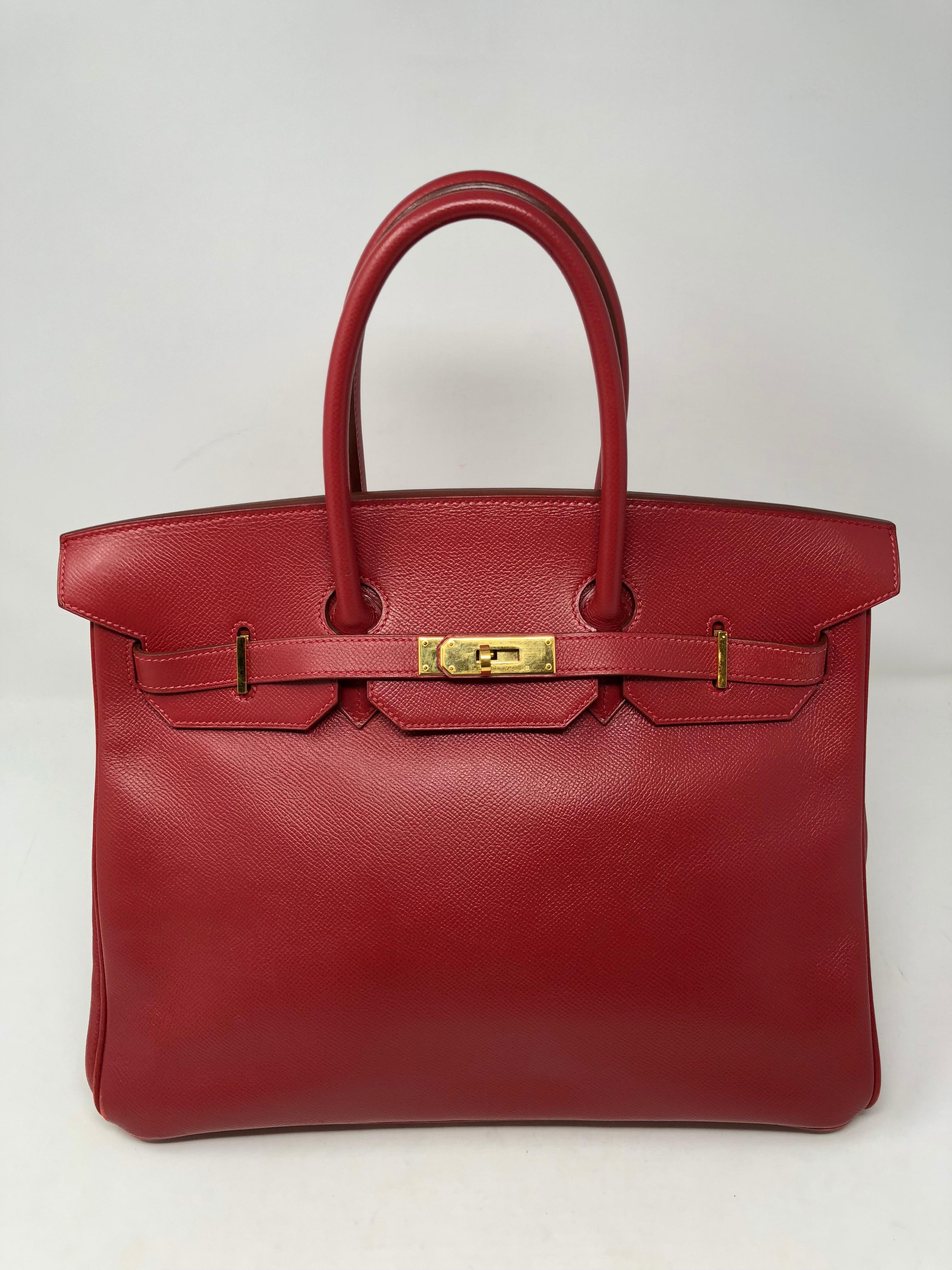 Hermes Red Birkin 35 Courchevel Leather from 1999. Beautiful red color with gold hardware. Good condition has slight wear on both corners. Comes with clochette and keys. A vintage Hermes that will stay a classic for life. Red with gold hardware is a