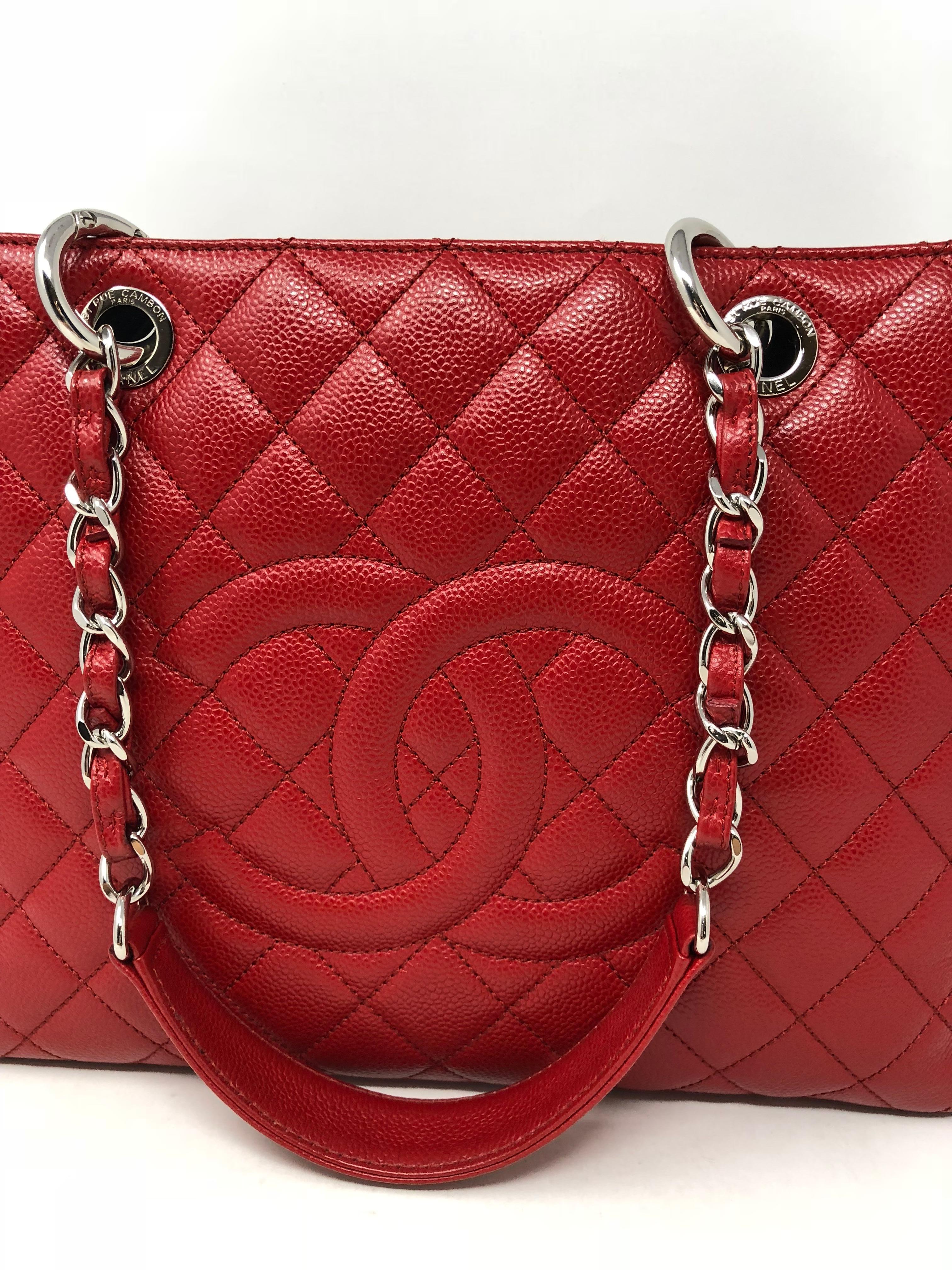 Chanel Red Grand Shopper Tote in Caviar leather with silver hardware. Excellent like new condition. Bright red color in this discontinued style bag from Chanel. Guaranteed authentic. 