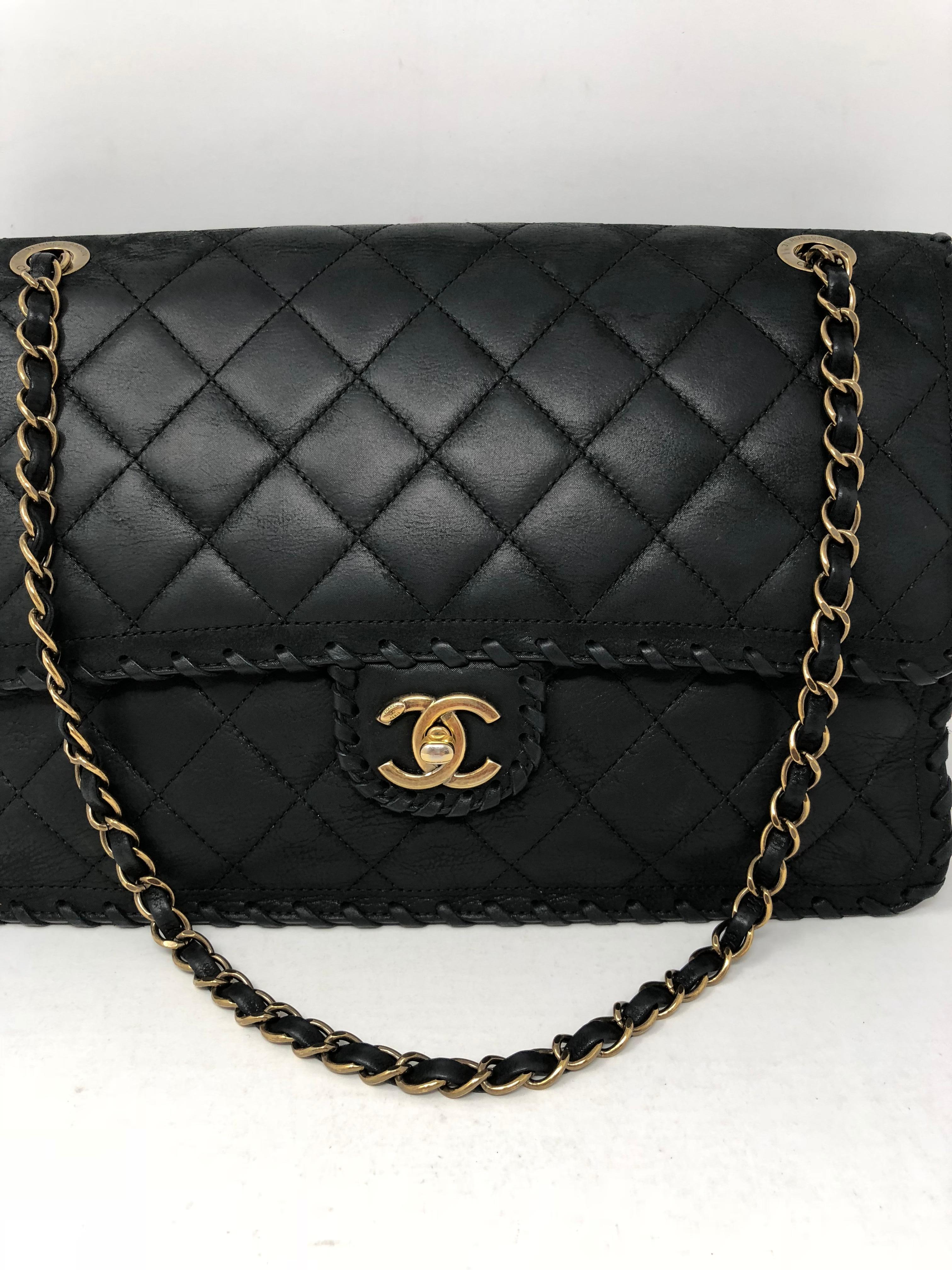 Chanel Black Happy Stitch Limited Edition Jumbo Bag in Calf leather. Series 21 with antique gold hardware. Good condition with authenticity card. Guaranteed authentic.