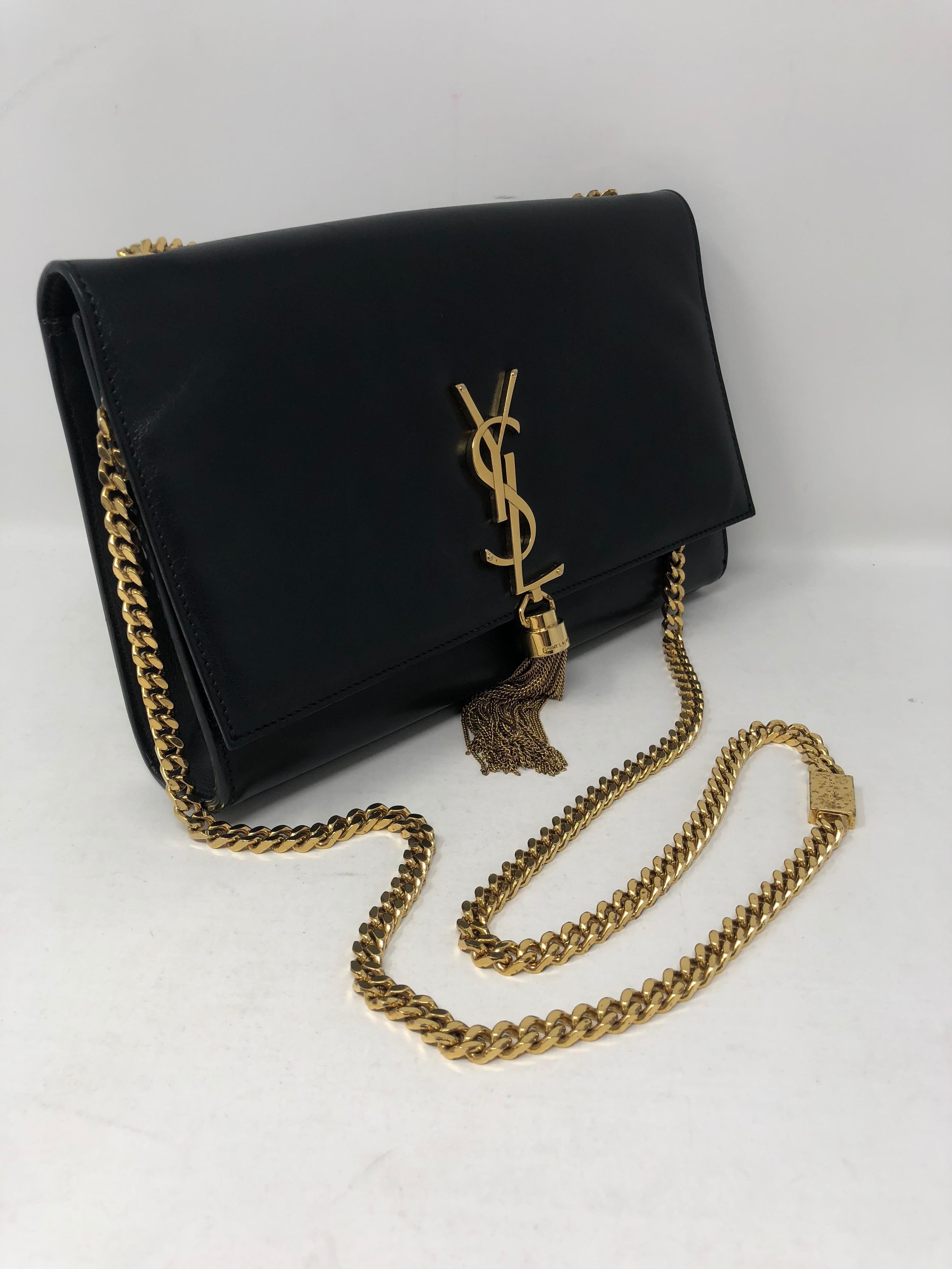 YSL Black Kate Bag with Fringe Tassel. Gold hardware. Beautiful clutch or crossbody bag. Guaranteed authentic. 