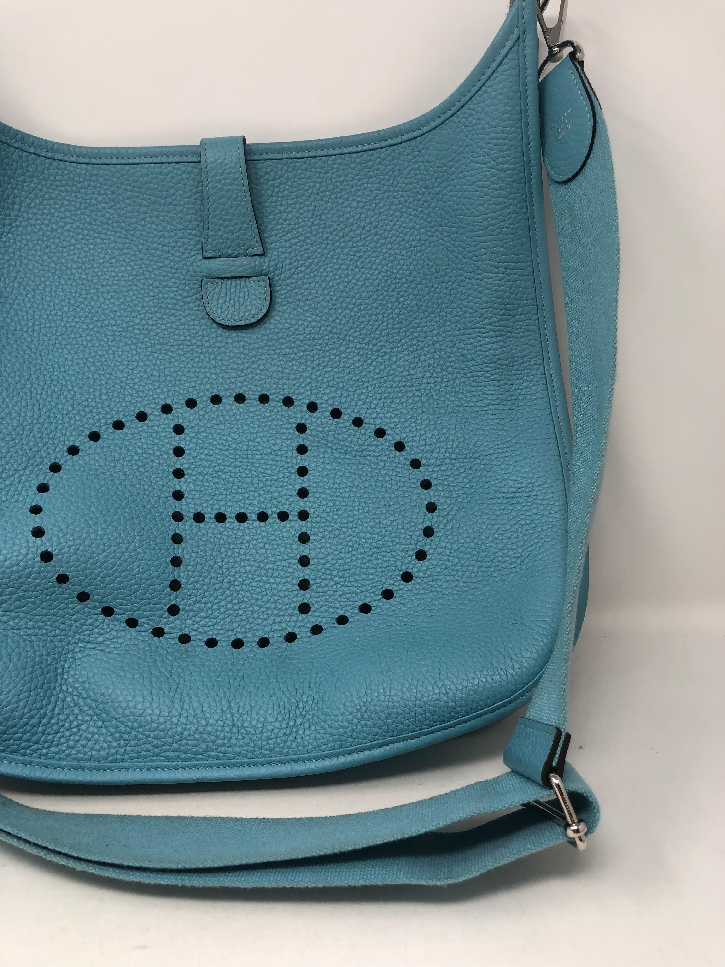 Hermes Teal Evelyne GM Crossbody Bag. Series 3 model with adjustable strap. Good condition. Light wear. Palladium hardware in beautiful teal, aqua color. Guaranteed authentic. 