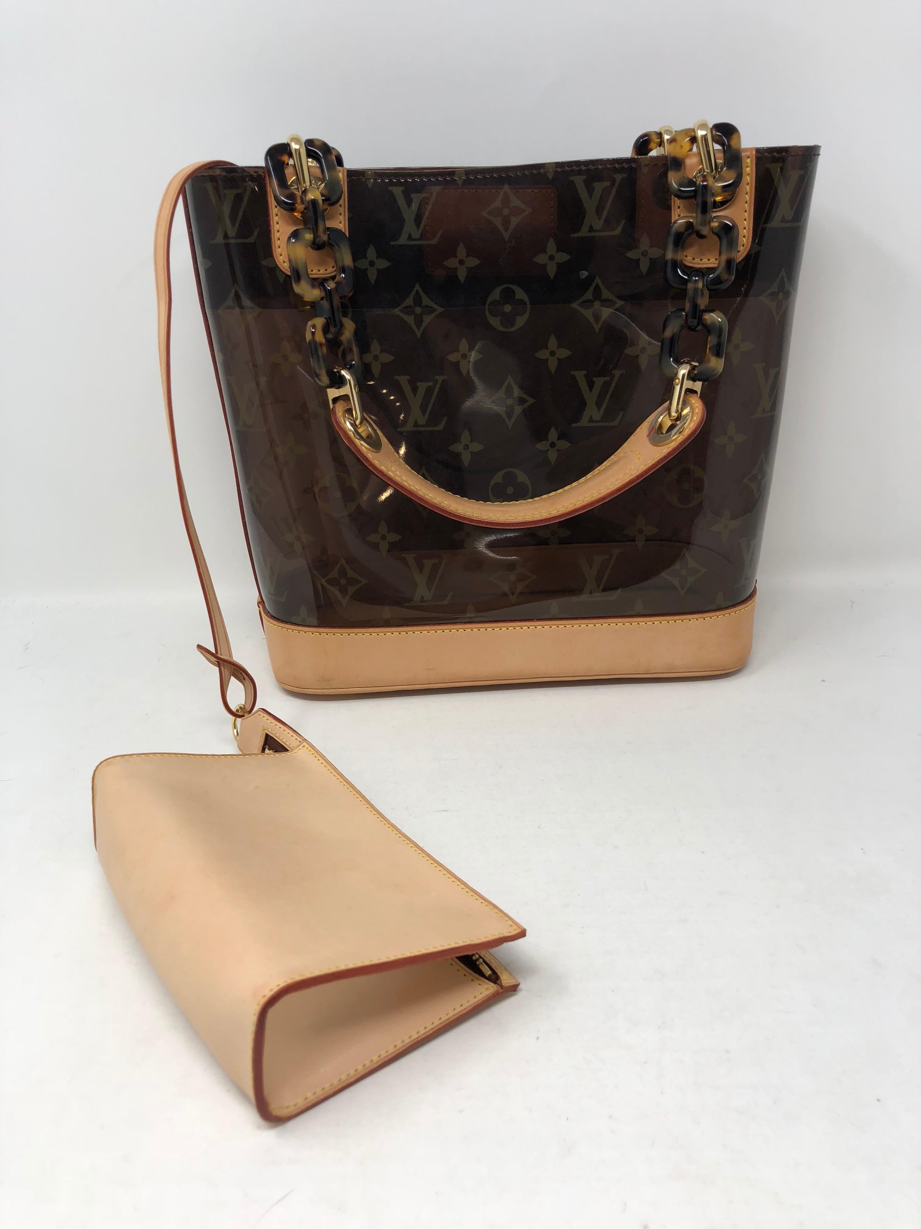 Louis Vuitton Cabas Ambre PM handbag with lucite tortoise chain and leather handles. The see through bag that allows you to see in the bag. A vintage Collector's piece by LV in good condition. Vachetta leather is still light. The 