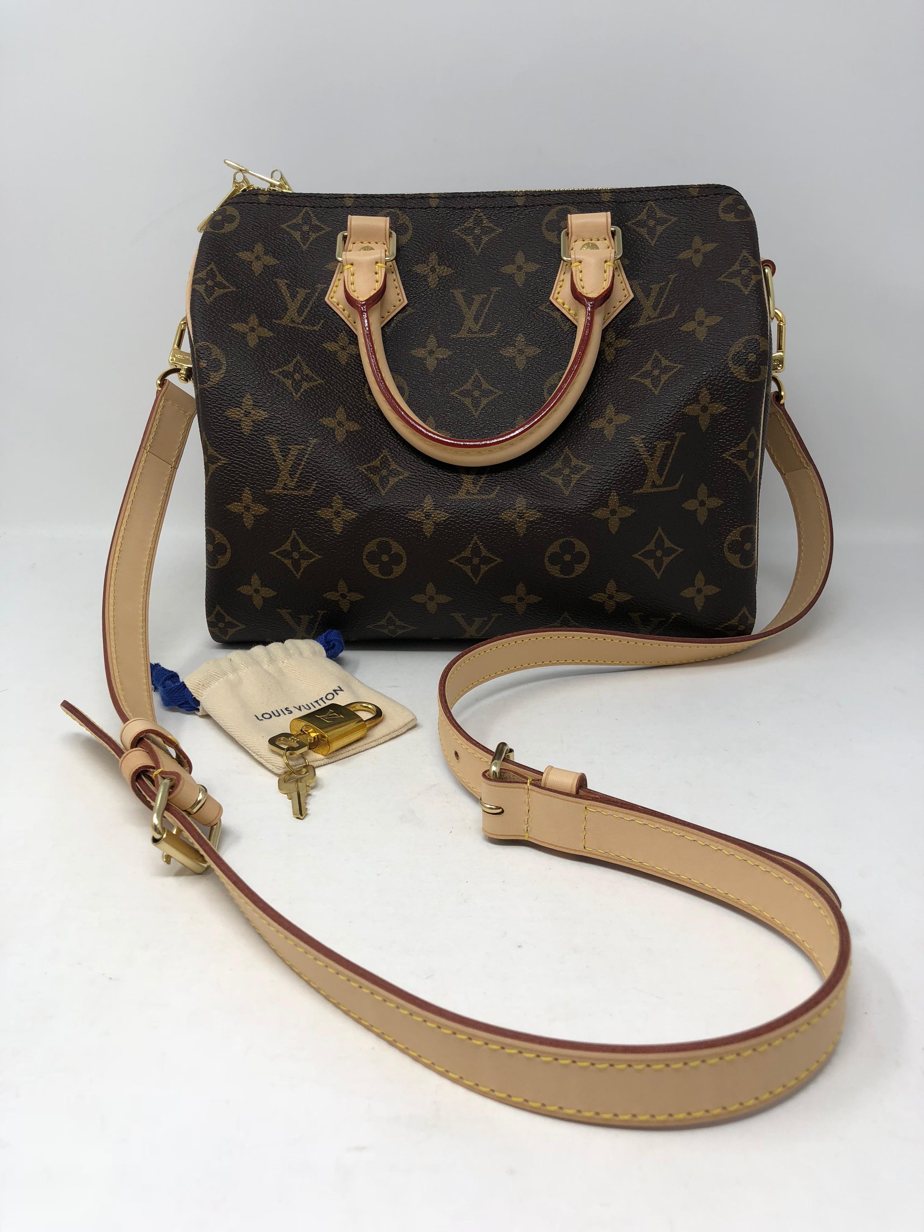 Louis Vuitton Speedy 25 Bandouliere in classic monogram canvas. Sold out and limited. Discontinued Speedy in monogram. This is brand new and comes with strap, original dust cover, lock, keys, and box. Guaranteed authentic. The most classic style.