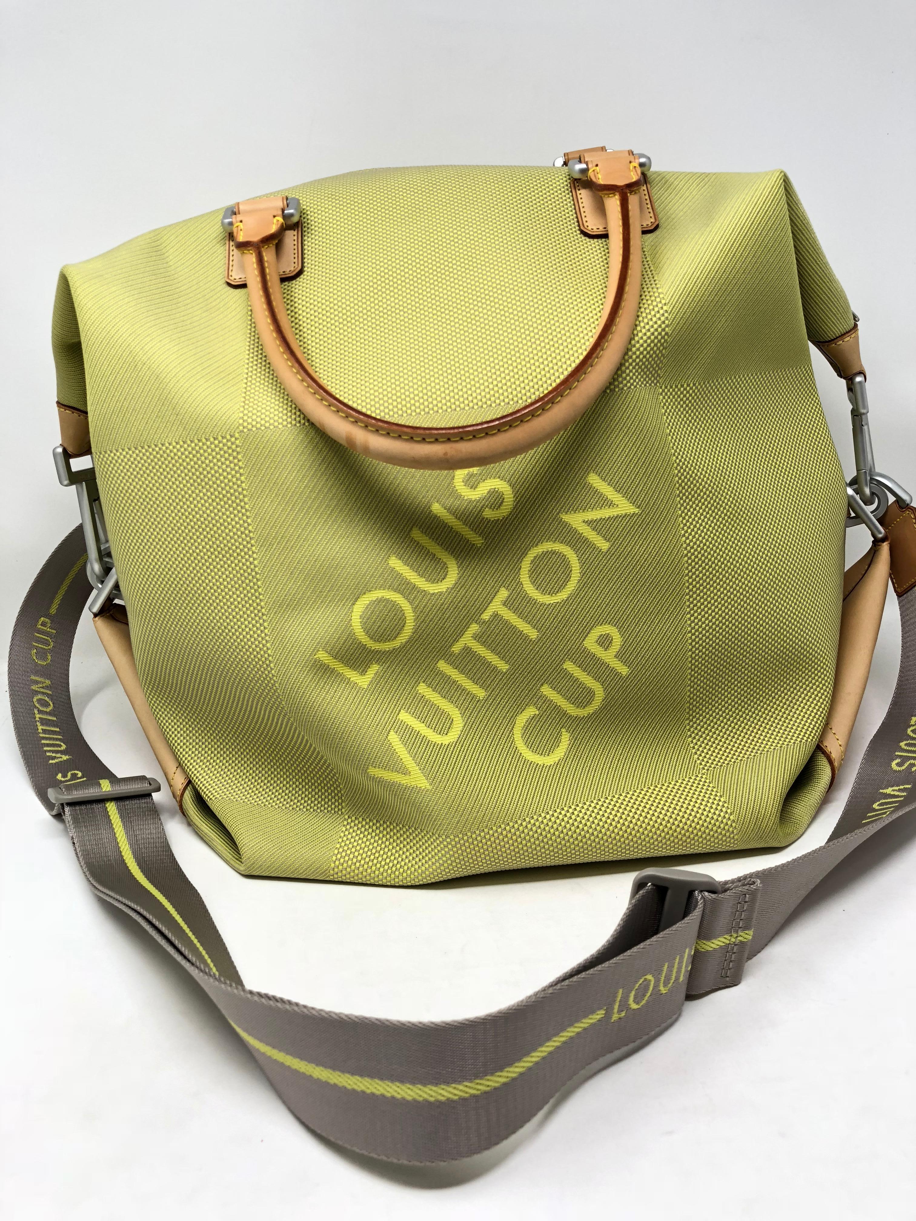 Louis Vuitton limited edition Lime Damier Geant Travel Bag from 2003 LV Cup. Rare limited bag in like new condition. Strap is adjustable. Guaranteed authentic. 