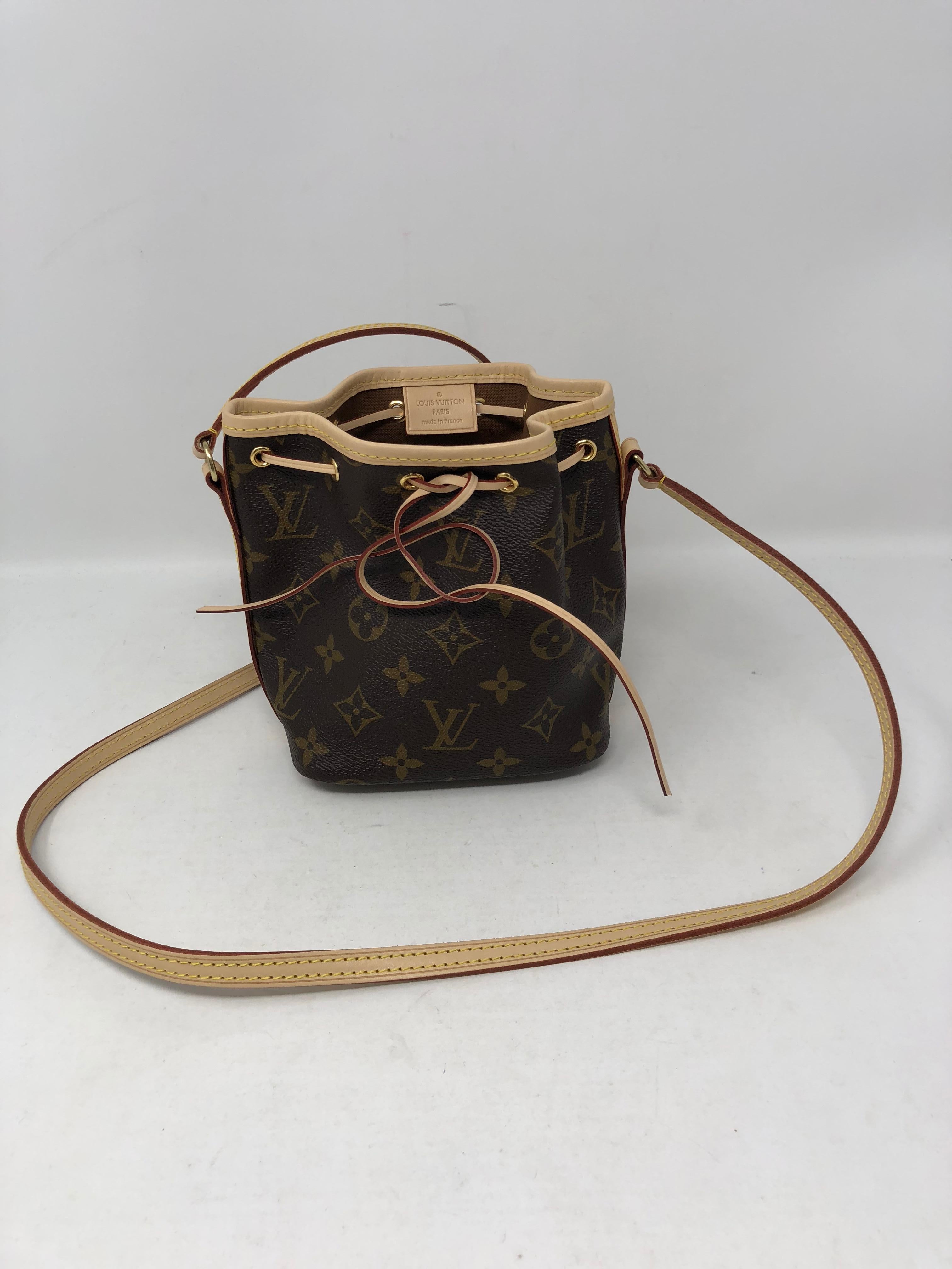 Louis Vuitton Monogram Mini Noe Bucket Crossbody bag. The smallest size made of this style in a crossbody. The Mini style is back. This is a limited item and sold out at LV. Brand new and never used. 