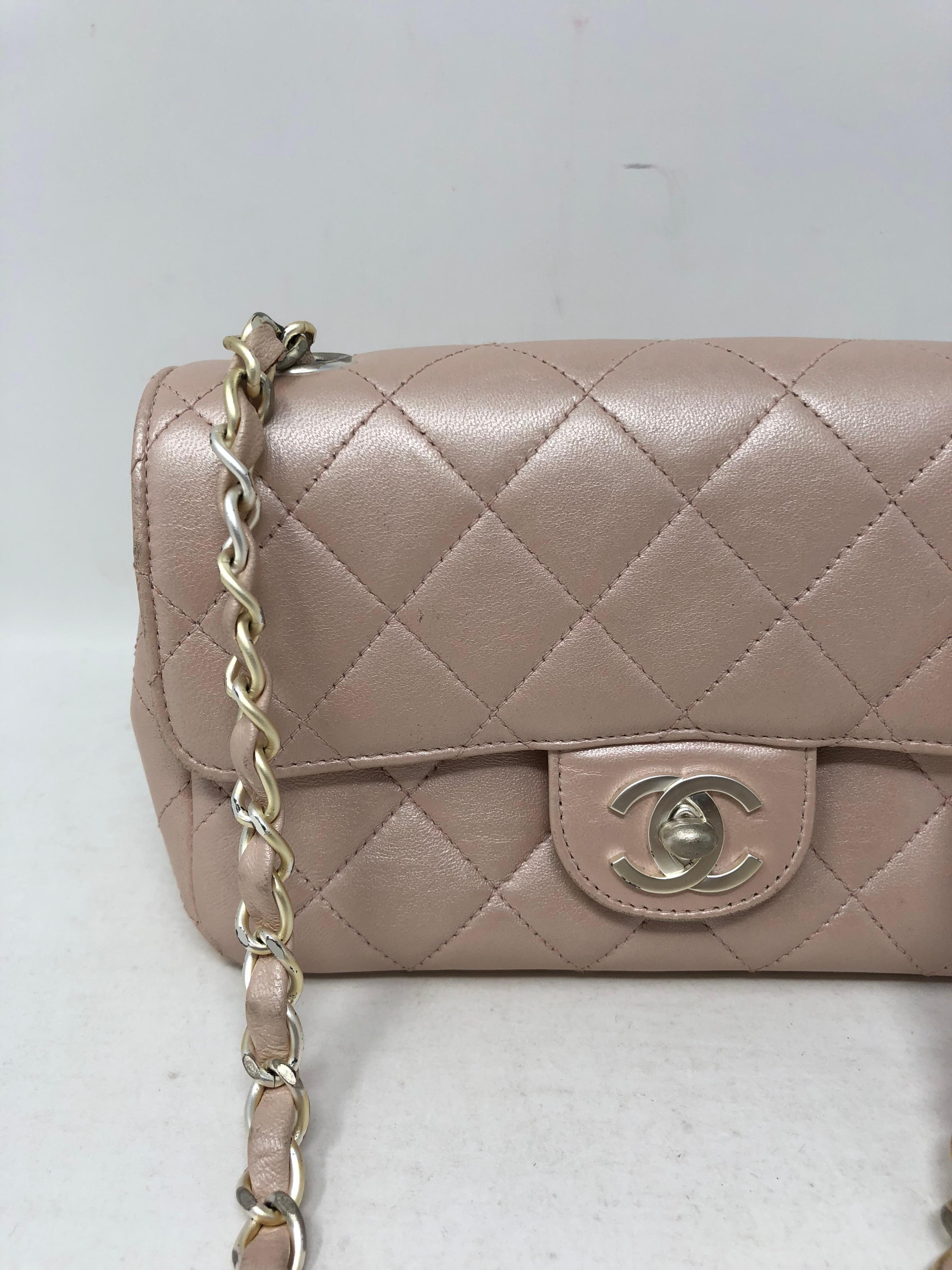 Chanel pale pink metallic crossbody bag with silver hardware. Fits a cell phone and wallet. Small size. Guaranteed authentic. 