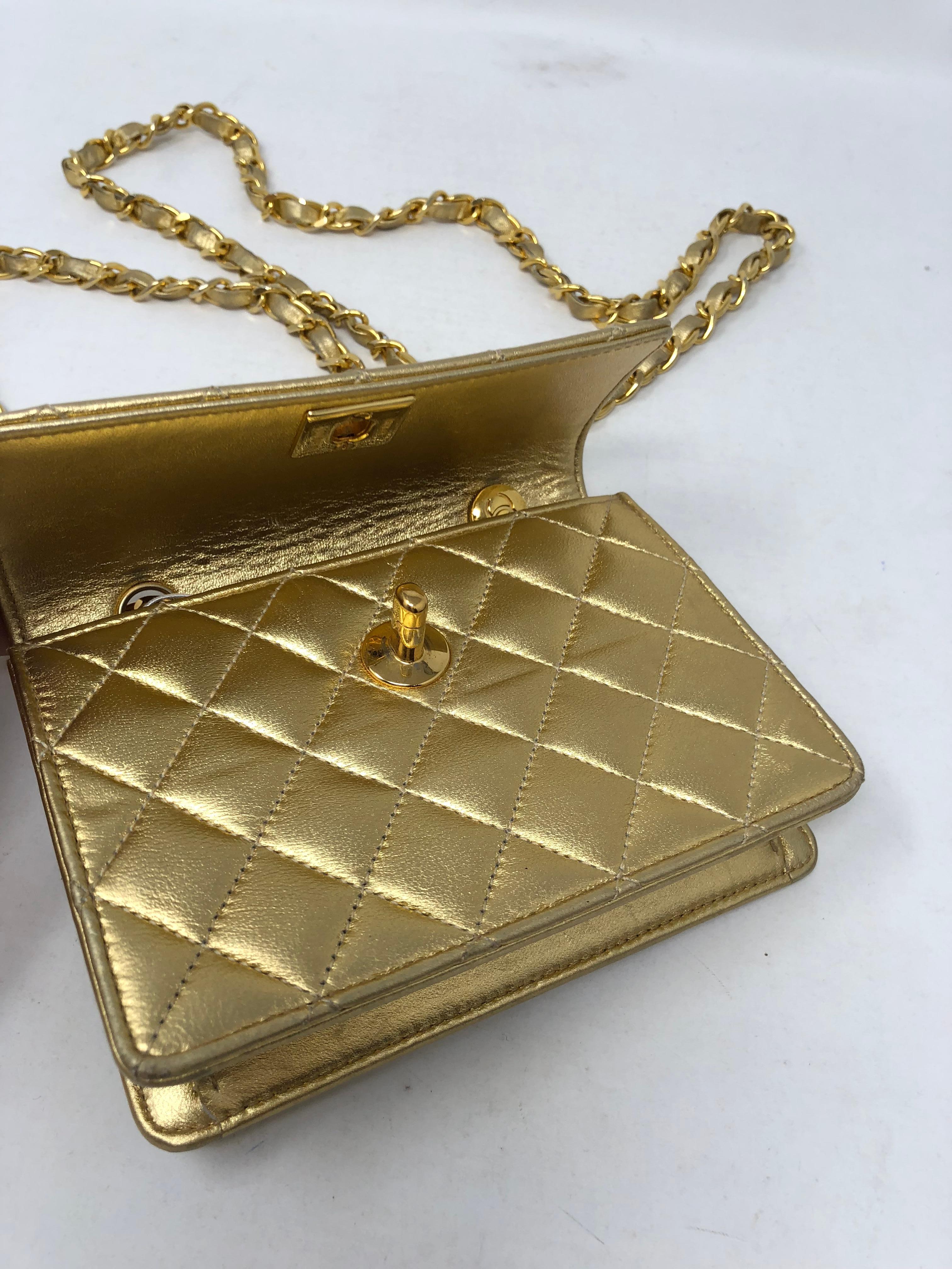 Women's or Men's Chanel Mini Gold Leather Crossbody Bag