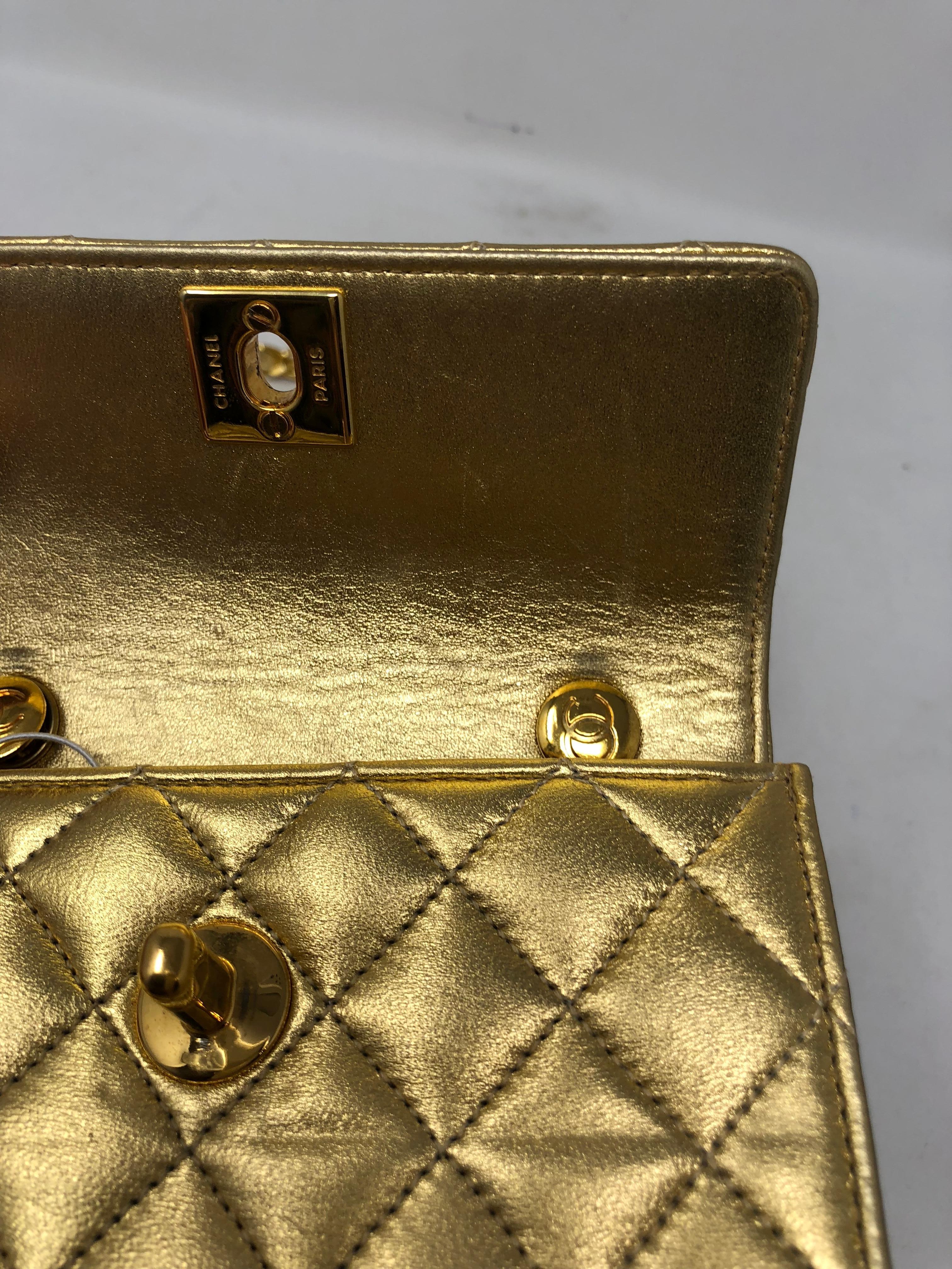 Chanel Mini Gold Leather Crossbody Bag 1