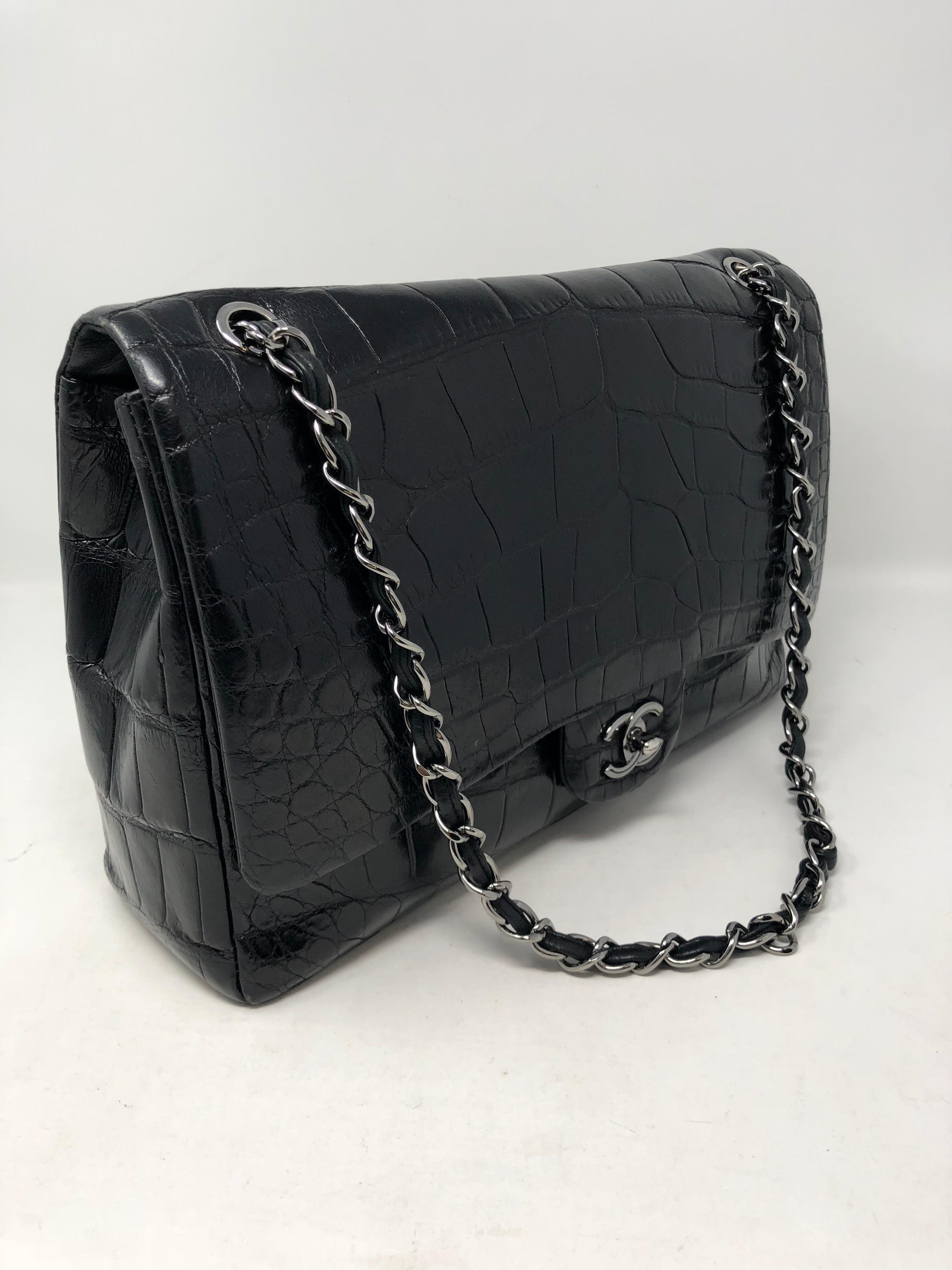Chanel Crocodile Black Jumbo Bag. Beautiful and rare crocodile bag with silver hardware. Stunnin bag in good condition. Celebrity owned and needs a good home. Most wanted Jumbo size 12