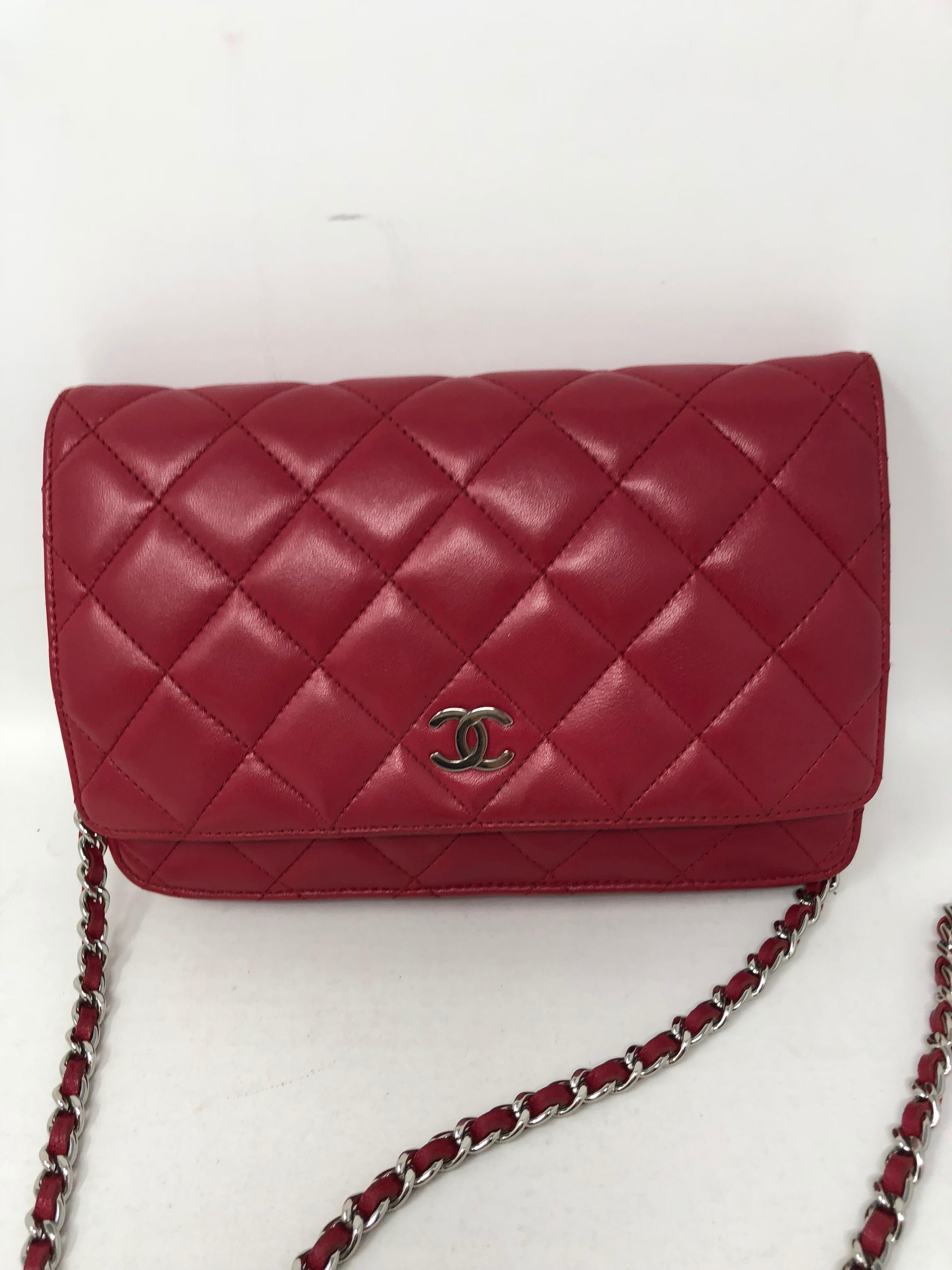 Chanel Raspberry hot pink Wallet on Chain Crossbody Bag. Bright hot pink leather with silver hardware. Mint condition. Hard to find color. Guaranteed authentic. 