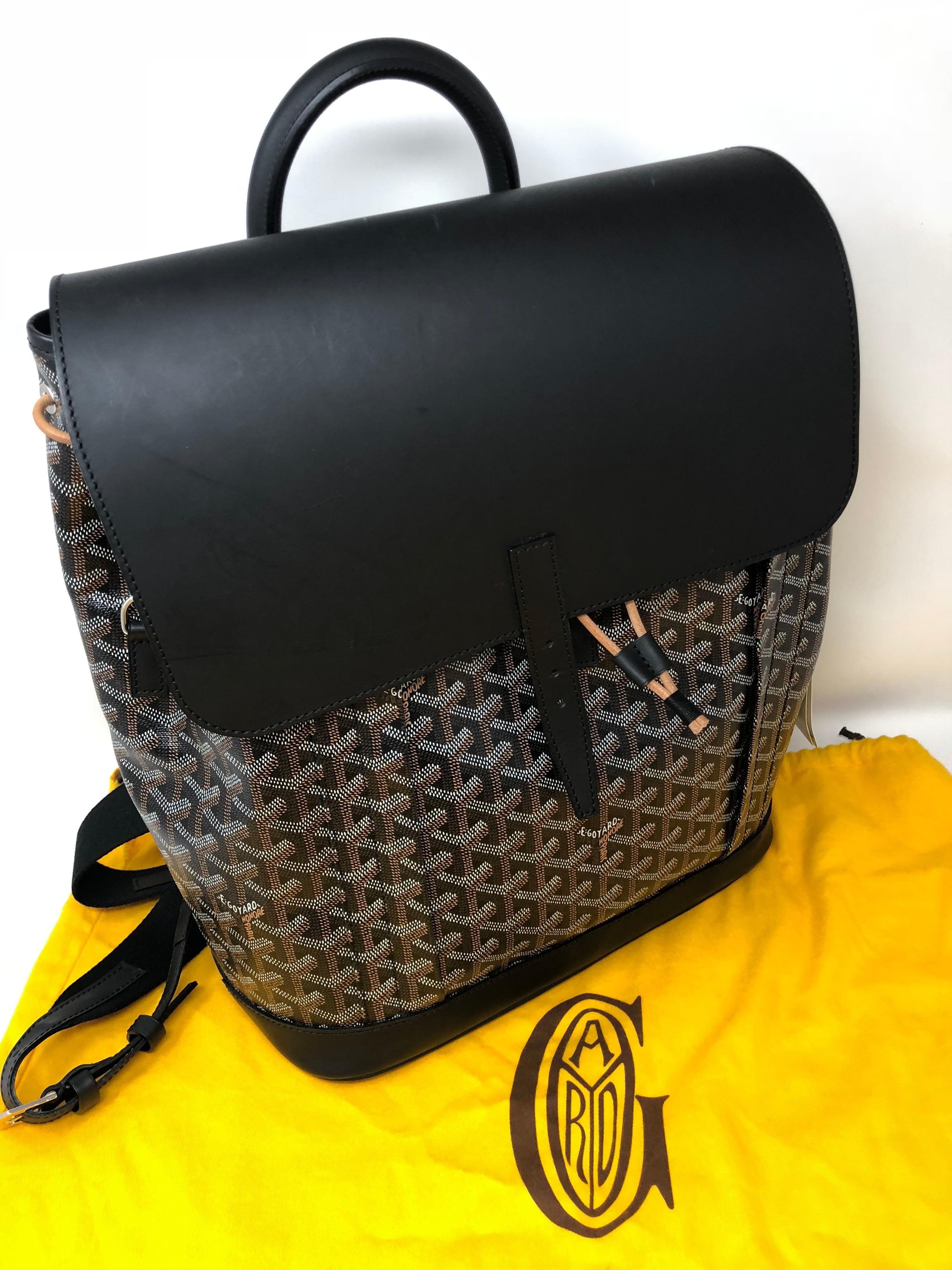 Goyard Alpin Black Chevron and Calfskin Backpack never used. The most coveted backpack with waiting lists over months. Comes with original dust cover.  Plastic still on hardware. The Alpin is the most wanted. Guaranteed authentic. 