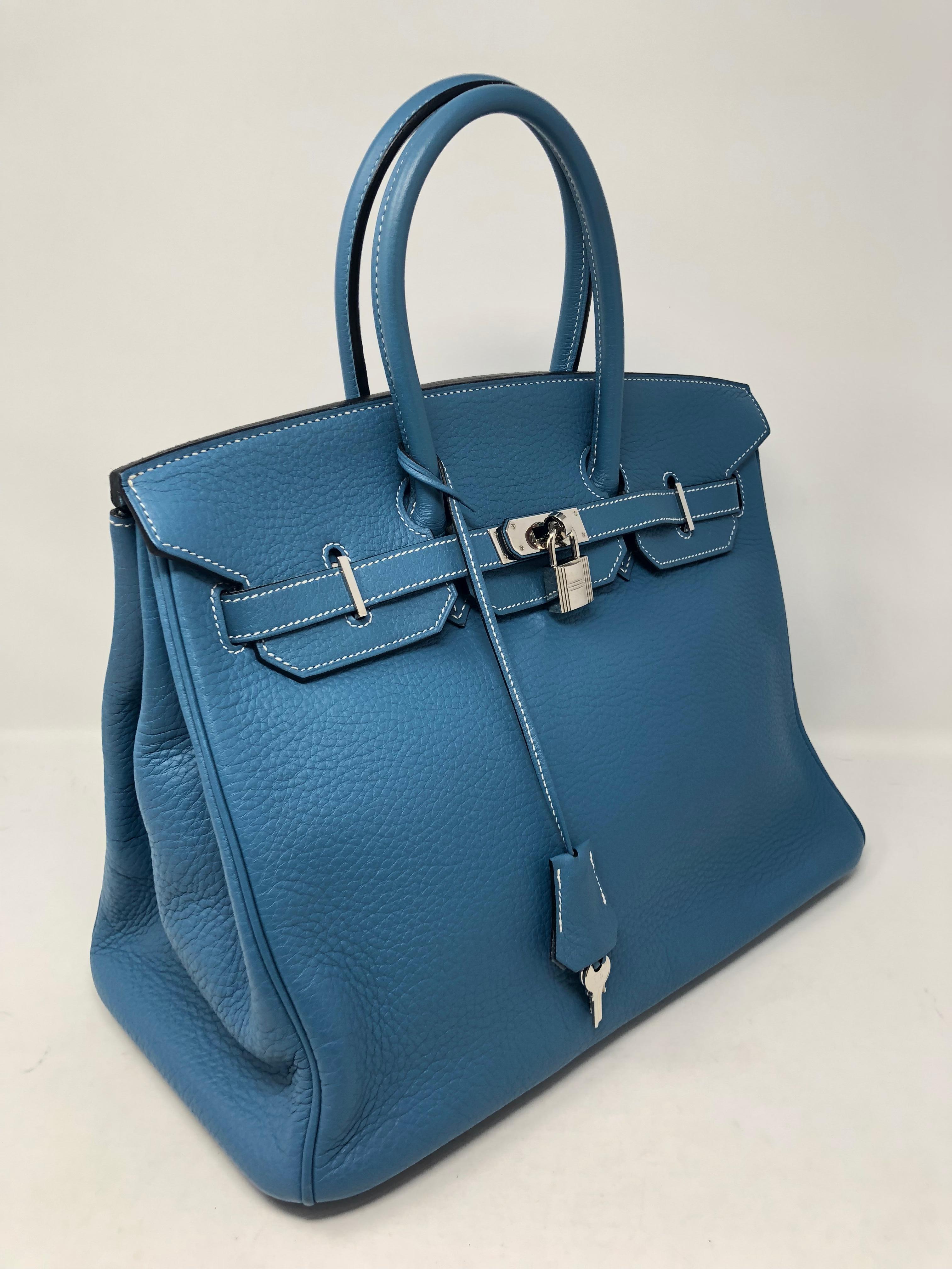 Hermes Birkin 35 Blue Jean with Palladium hardware. Very Good condition. J stamp. Beautiful color. A classic Hermes color. Great investment bag. Includes dust cover. Guaranteed authentic. 