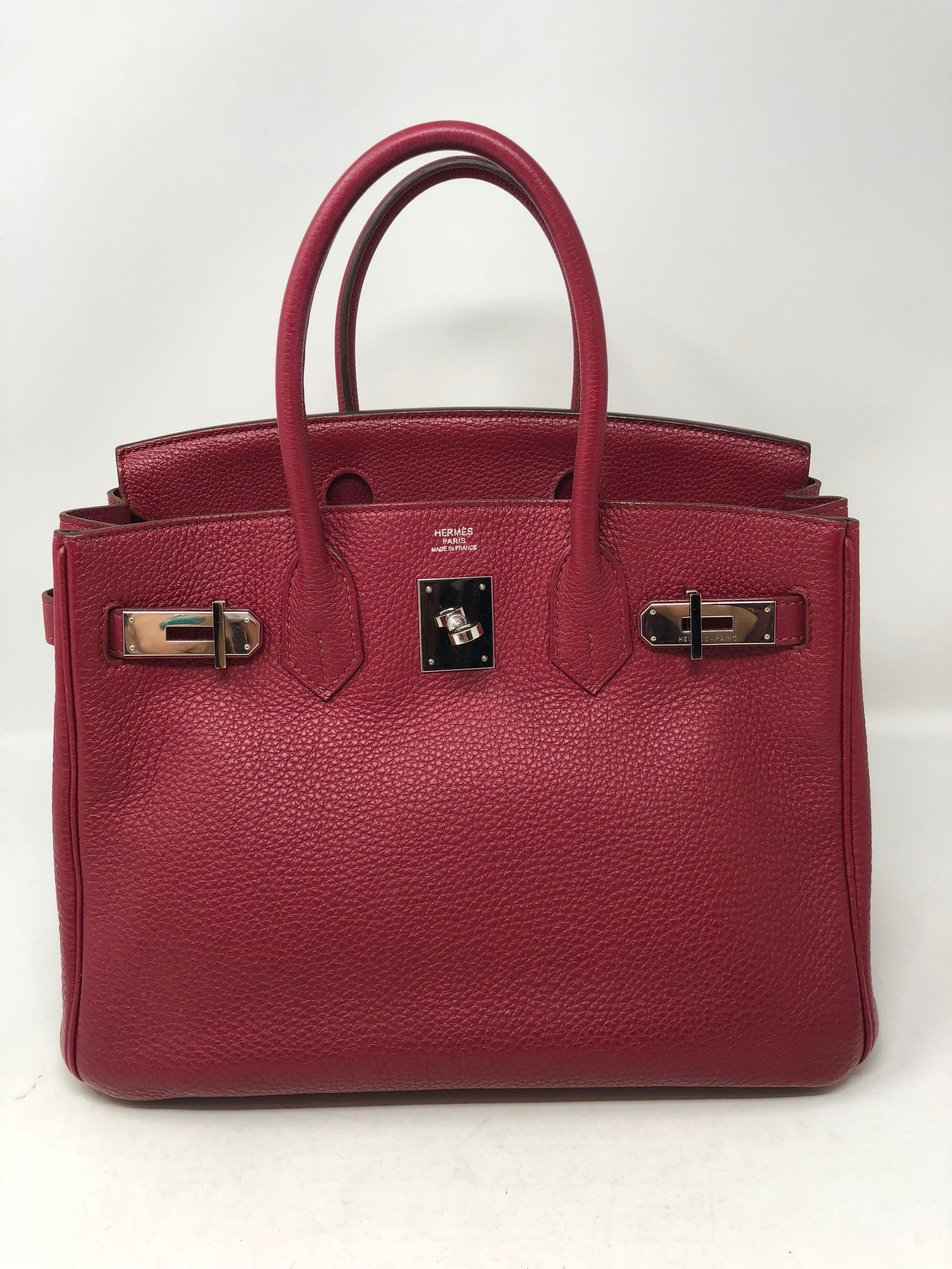 Hermes Birkin 30 in Rubis color. Togo leather in this cranberry red color. Most wanted size and hard to get. Looks like new from 2010. N square. Comes with dust cover, clochette, lock and keys. Guaranteed authentic. 