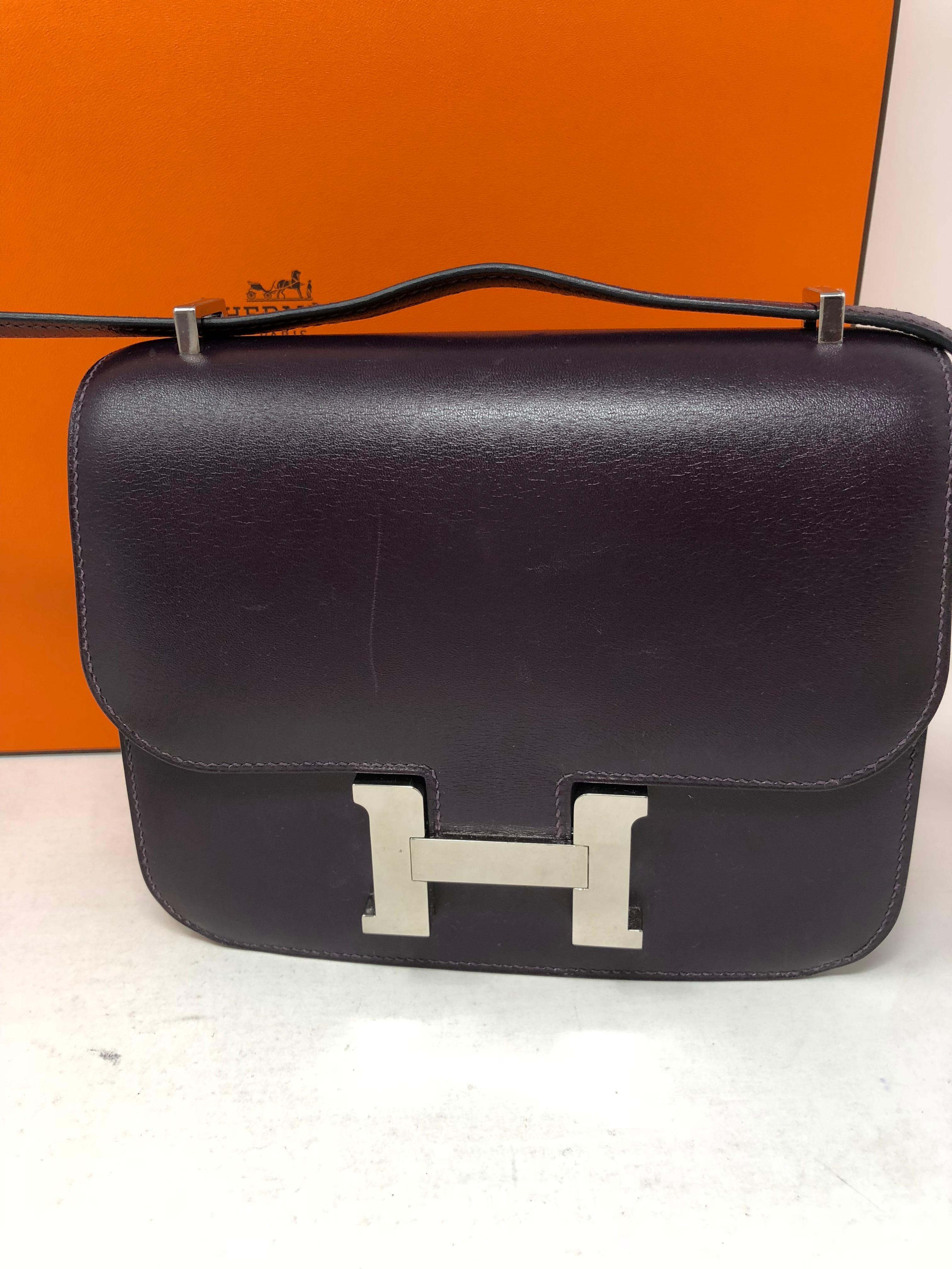 Hermes Constance Purple Mini 18 Bag. Dark purple color swift leather. Palladium hardware. Rare hard to find Constance especially in this mini size. Color is rare too. Good condition. Light surface scratches. Bag can worn longer or doubled.