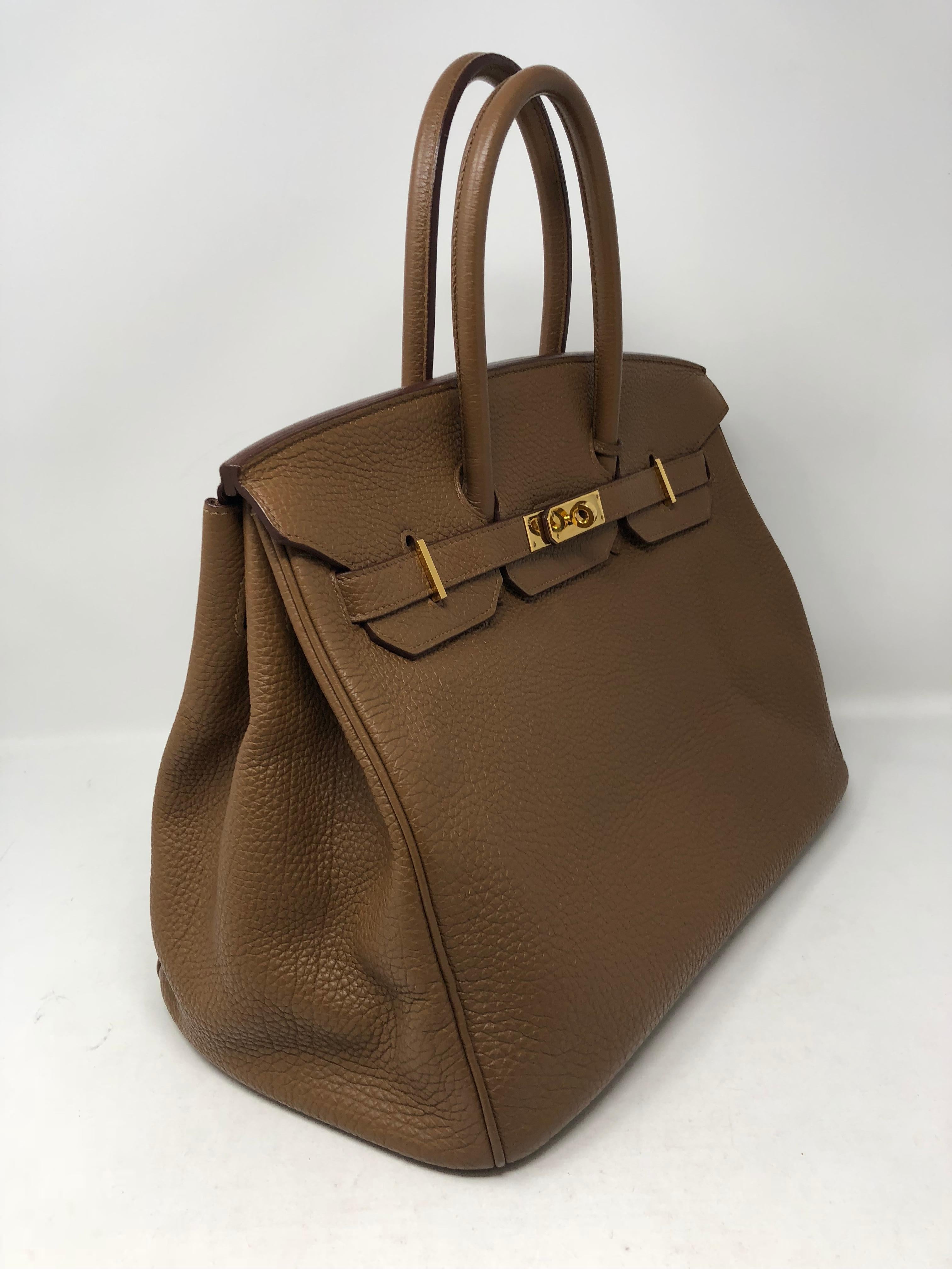 Hermes Birkin 35 Alezan tan color in gold hardware. Togo leather and in good condition. Slight wear on one of the handles. Can be cleaned and restored at Hermes. Bag includes dust cover, clochette, lock and keys. Stamped M square from 2009. 