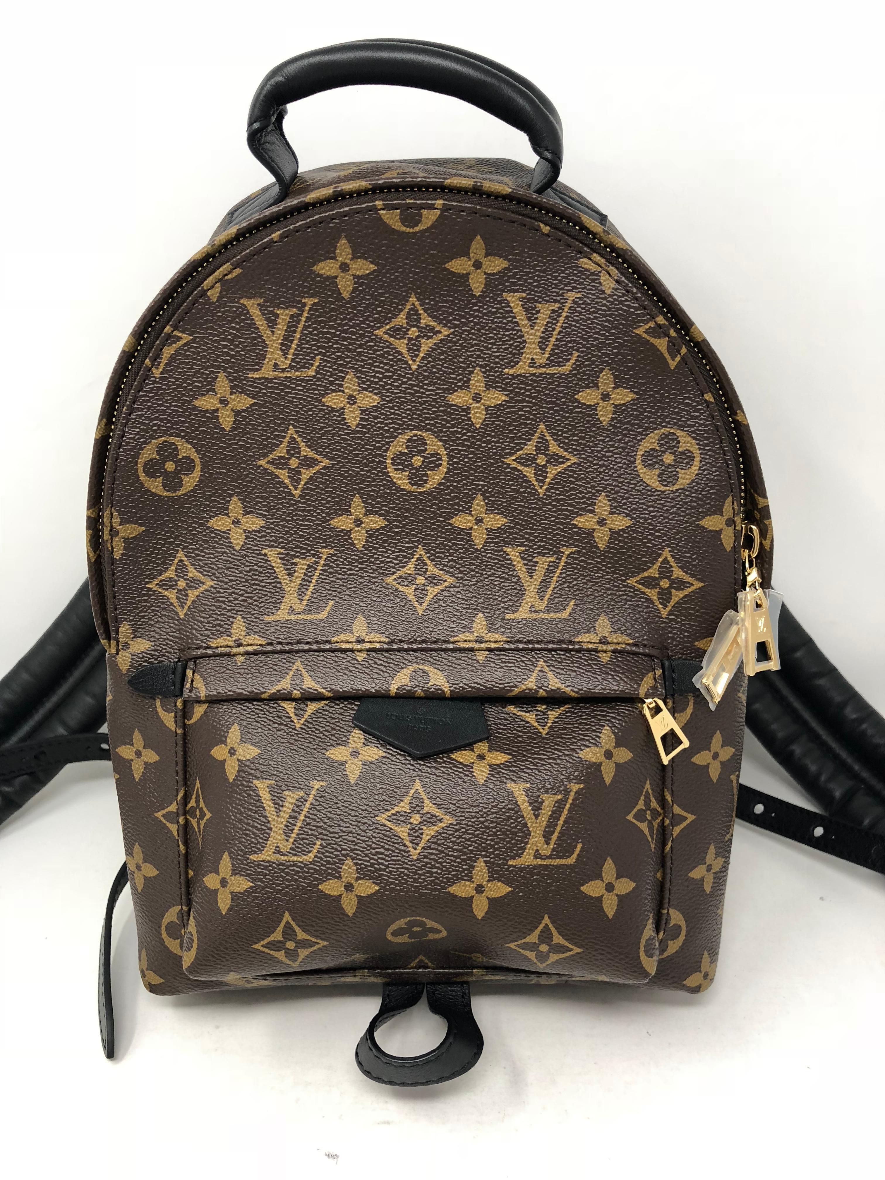 Louis Vuitton Palm Springs Backpack MM in Monogram. Extremely comfortable with rolled leather shoulder straps in black leather. Plenty of space to hold all your essentials. This is the most coveted ackpack from LV. Sold out and limited. Brand new