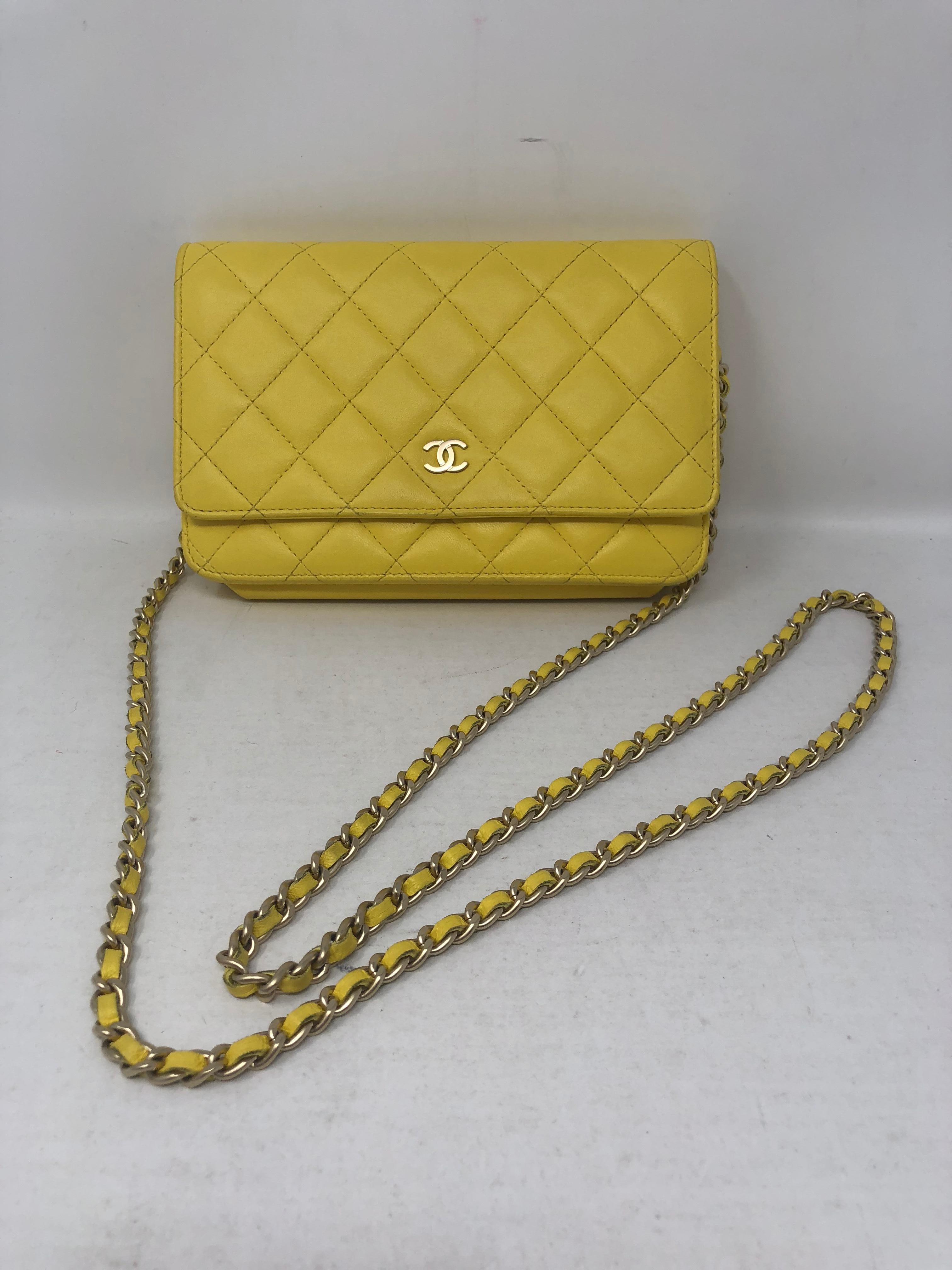 Chanel Yellow Wallet on Chain Crossbody Bag. Bright canary yellow lambskin leather with silver hardware. Good condition. Most wanted crossbody by Chanel. Includes authenticity card and original dust cover. Guaranteed authentic. 