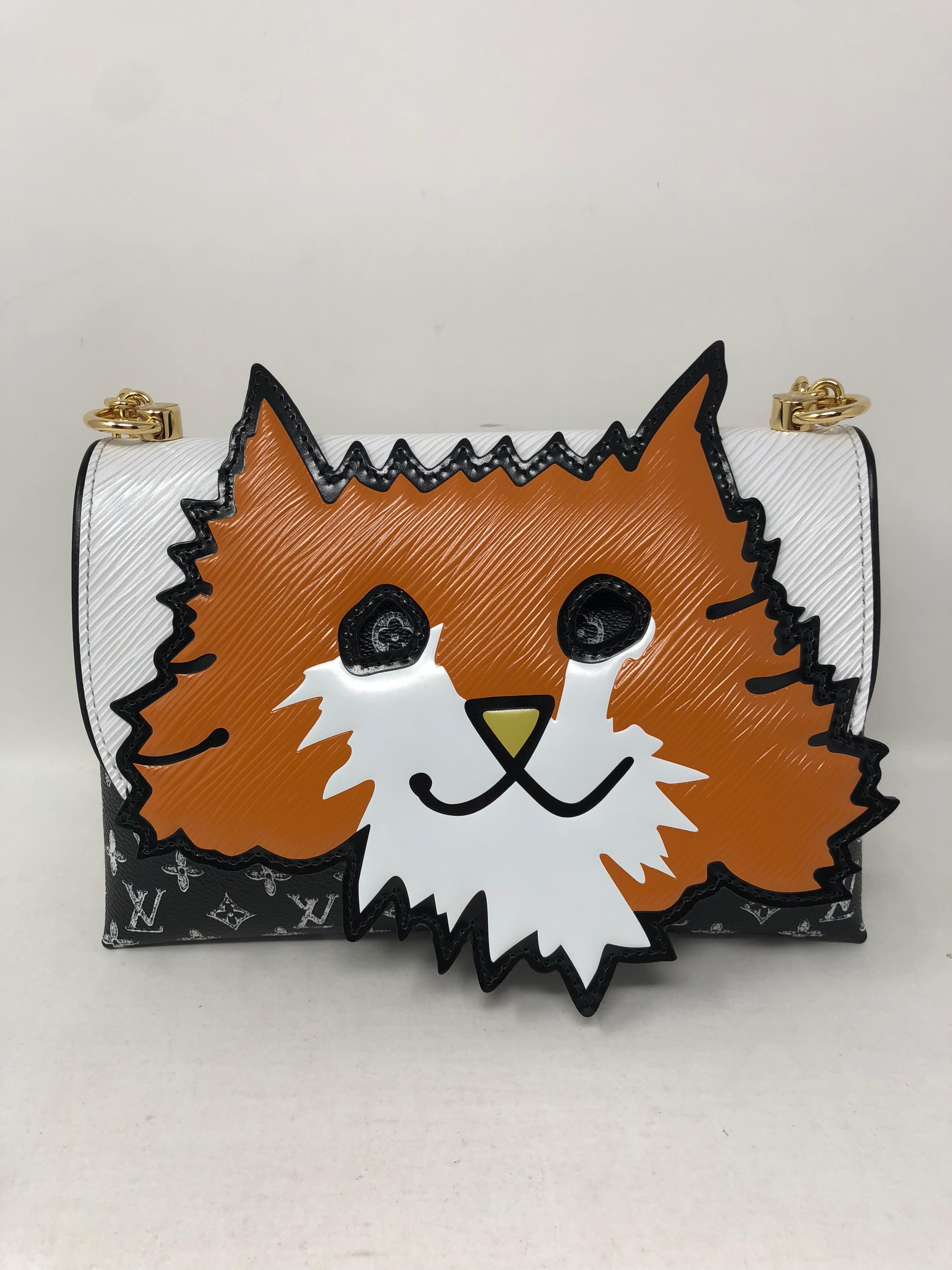 Louis Vuitton Orange Cat Chain Clutch from Grace Coddington Collaboration. From the Cruise 2019 Collection and the hottest bag. Very limited and sold out. This is the true animal lover's dream bag. A wonderful mix of LV signature monogram in indigo