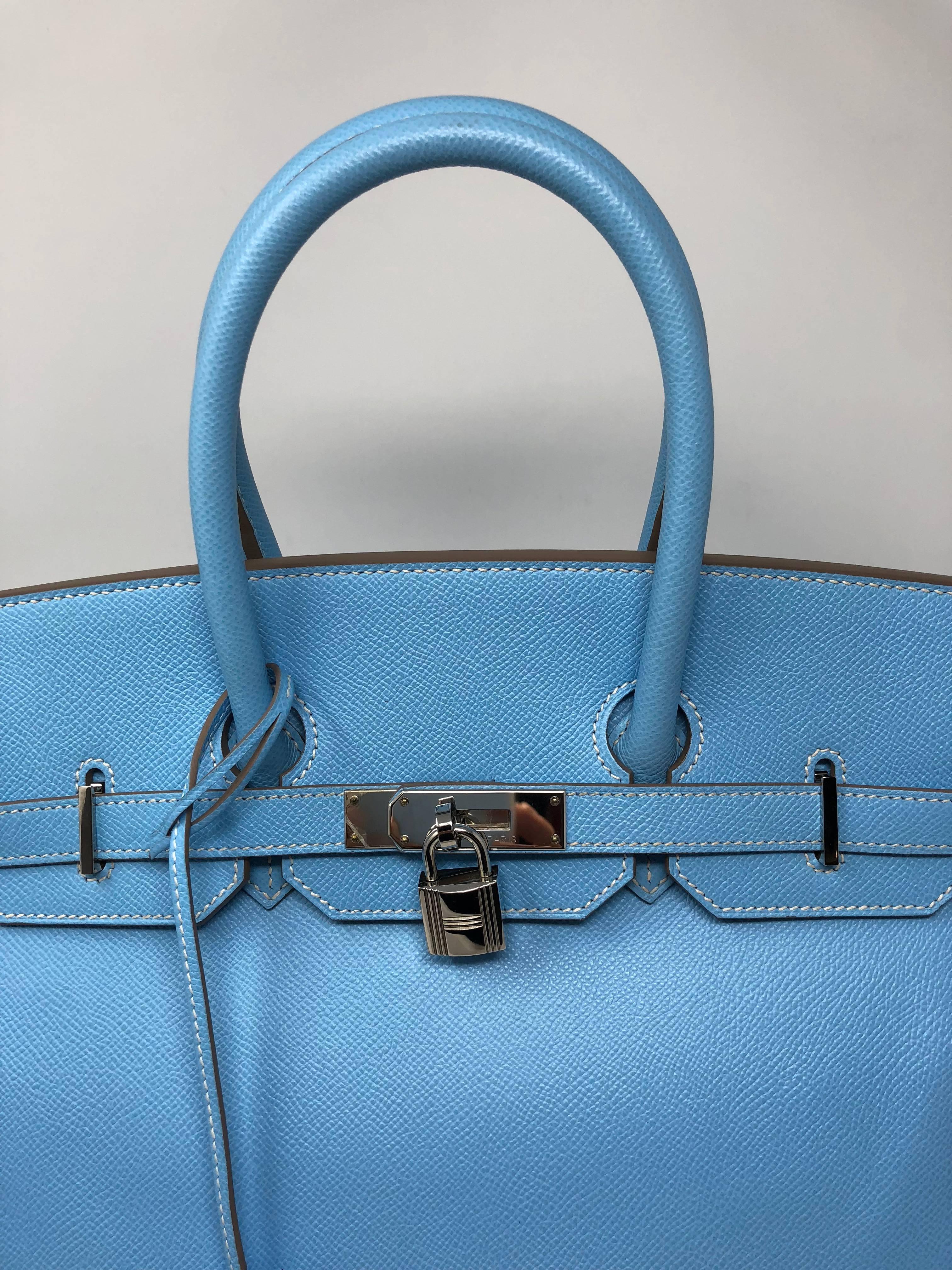 Hermes Birkin 35 (Candy edition) in Veau Epsom leather. Color Celeste blue exterior and interior Mykonos blue. Palladium hardware. Mint conditon like new. From 2011 (O square). Comes with clochette, keys, and dust cover. Guaranteed authentic. 