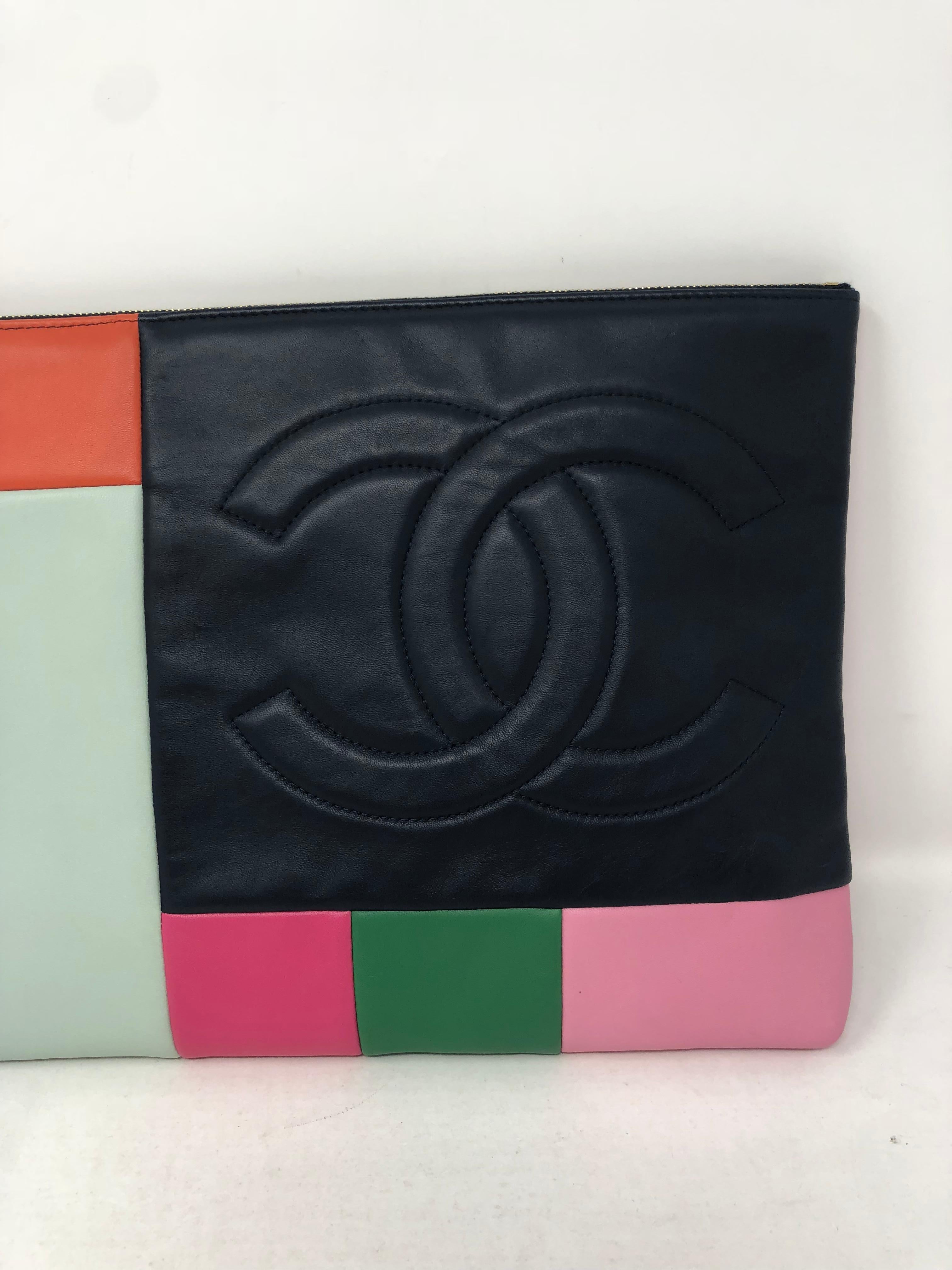 Chanel Color-block Clutch in mint condition. All leather blocks of color make up this beautiful bag. Fits an ipad too. Versatile look and bigger clutch. Guaranteed authentic. 