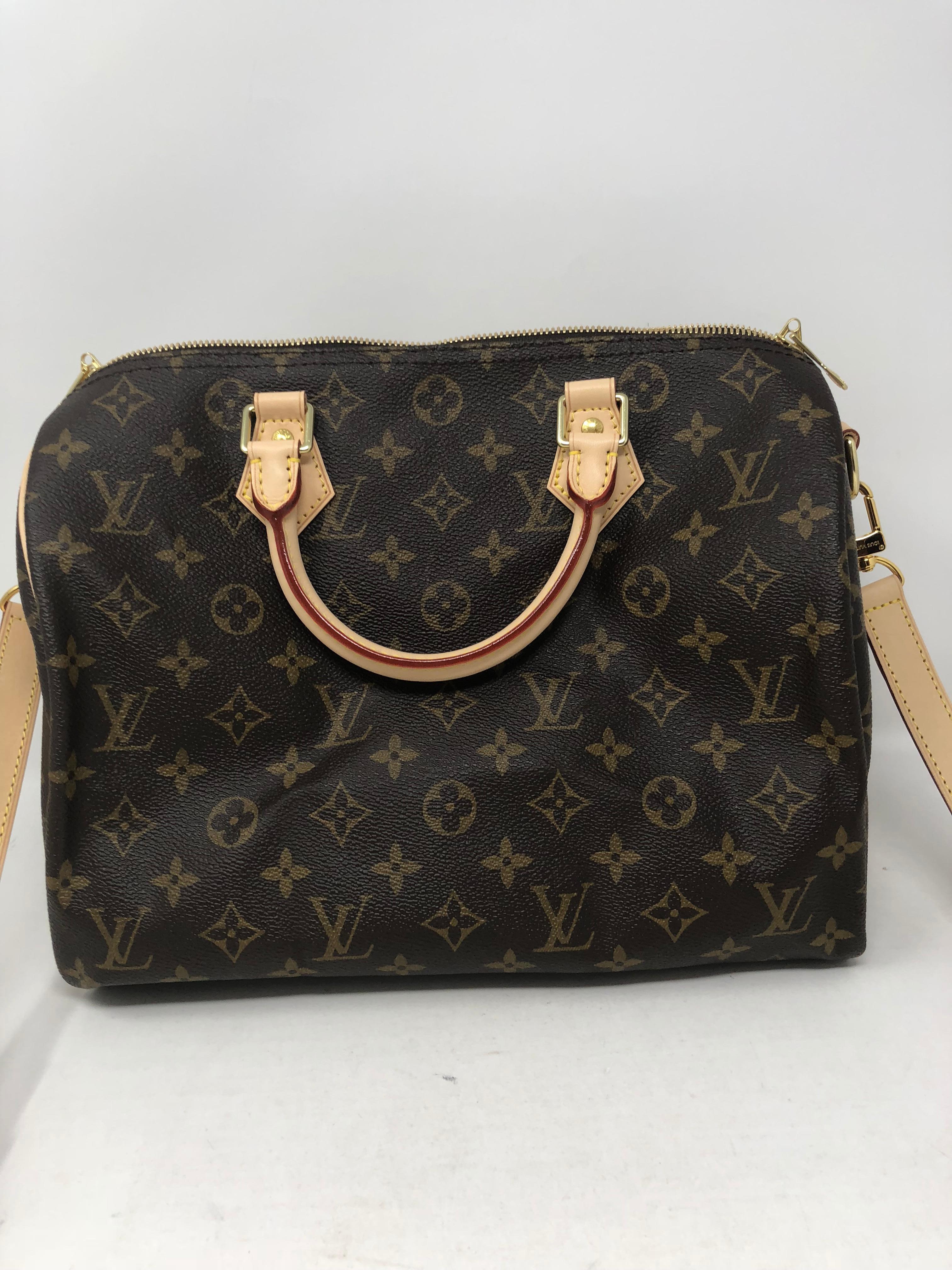 Louis Vuitton Speedy 30 Bandouliere in monogram. Iconic classic with adjustable strap. Can be worn with or without strap. Brand new and never used. Includes original dust cover and box. Guaranteed authentic. 