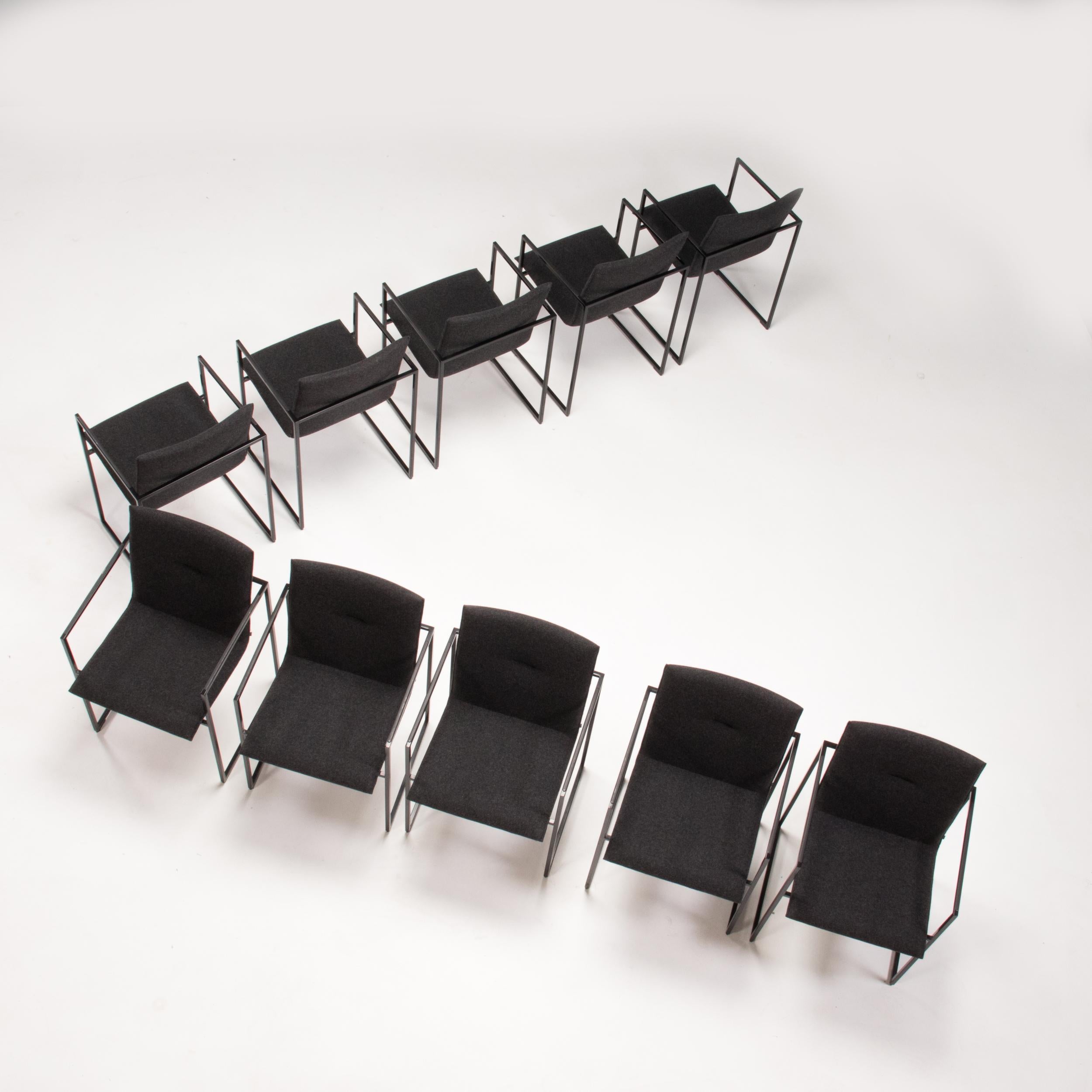 Originally designed by Burkhard Vogtherr for Arco in 2000, the Frame dining chair remains a classic piece of design.

Featuring a slimline, angular black metal frame, the dining chair gives the impression of the seat floating within it.

The sling