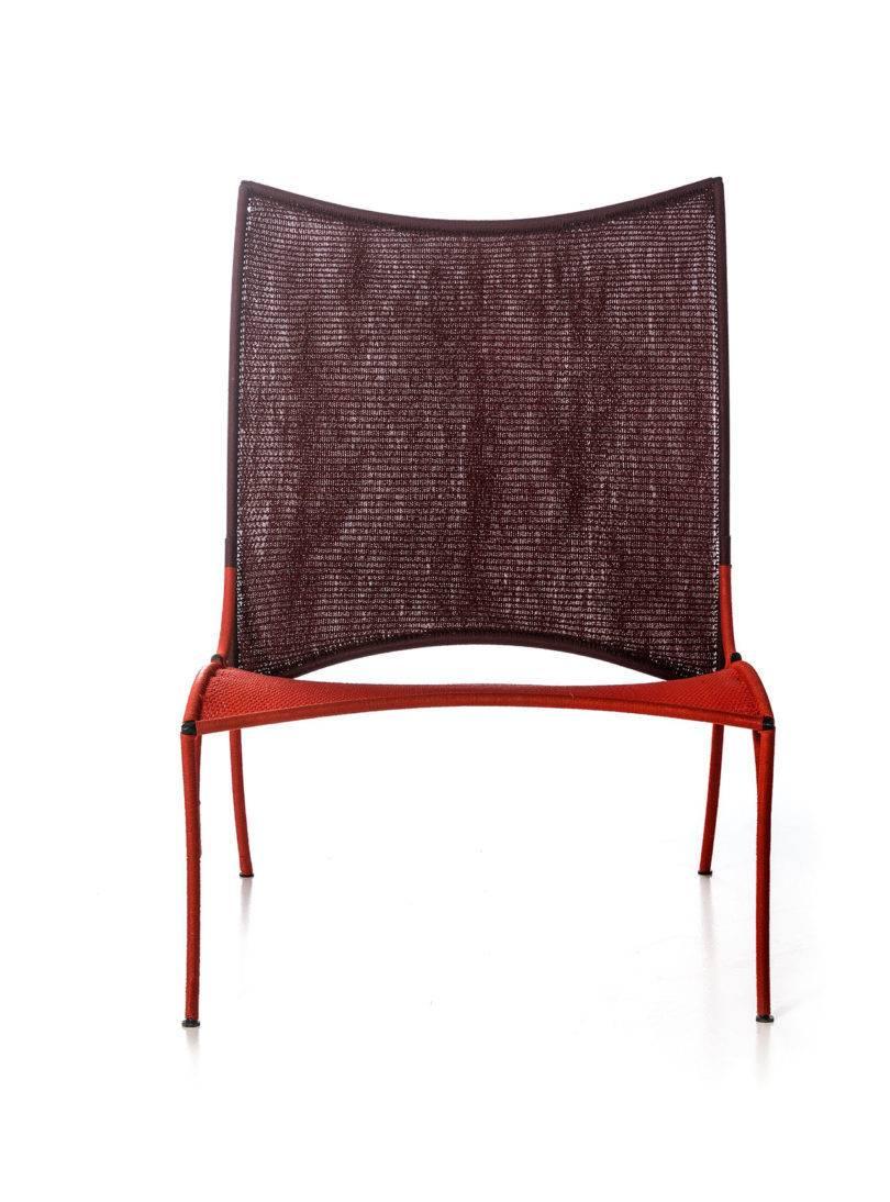 Arco chair A. by Martino Gamper for Moroso for indoor and outdoor in multi-color.

The Arco collection is part of the M’Afrique collection, a range of chairs conceived by various designers and produced by African Craft weavers using the yarn of