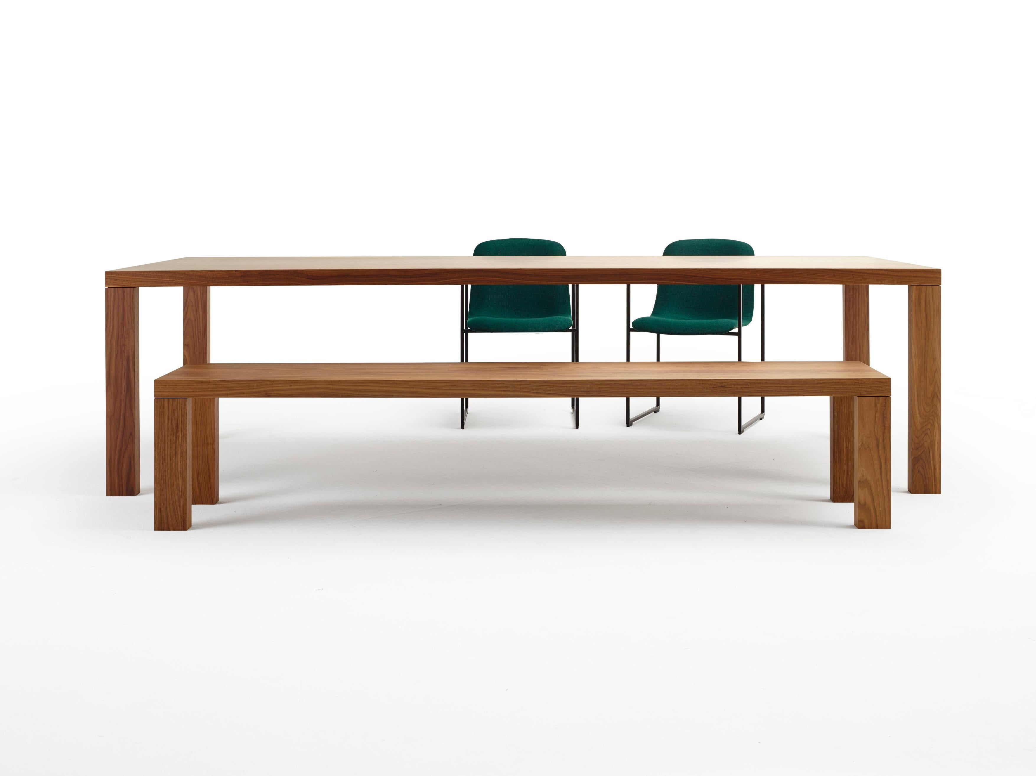 A solid wooden bench to complement the elegant Essenza table. Available in oak as well as in walnut.
