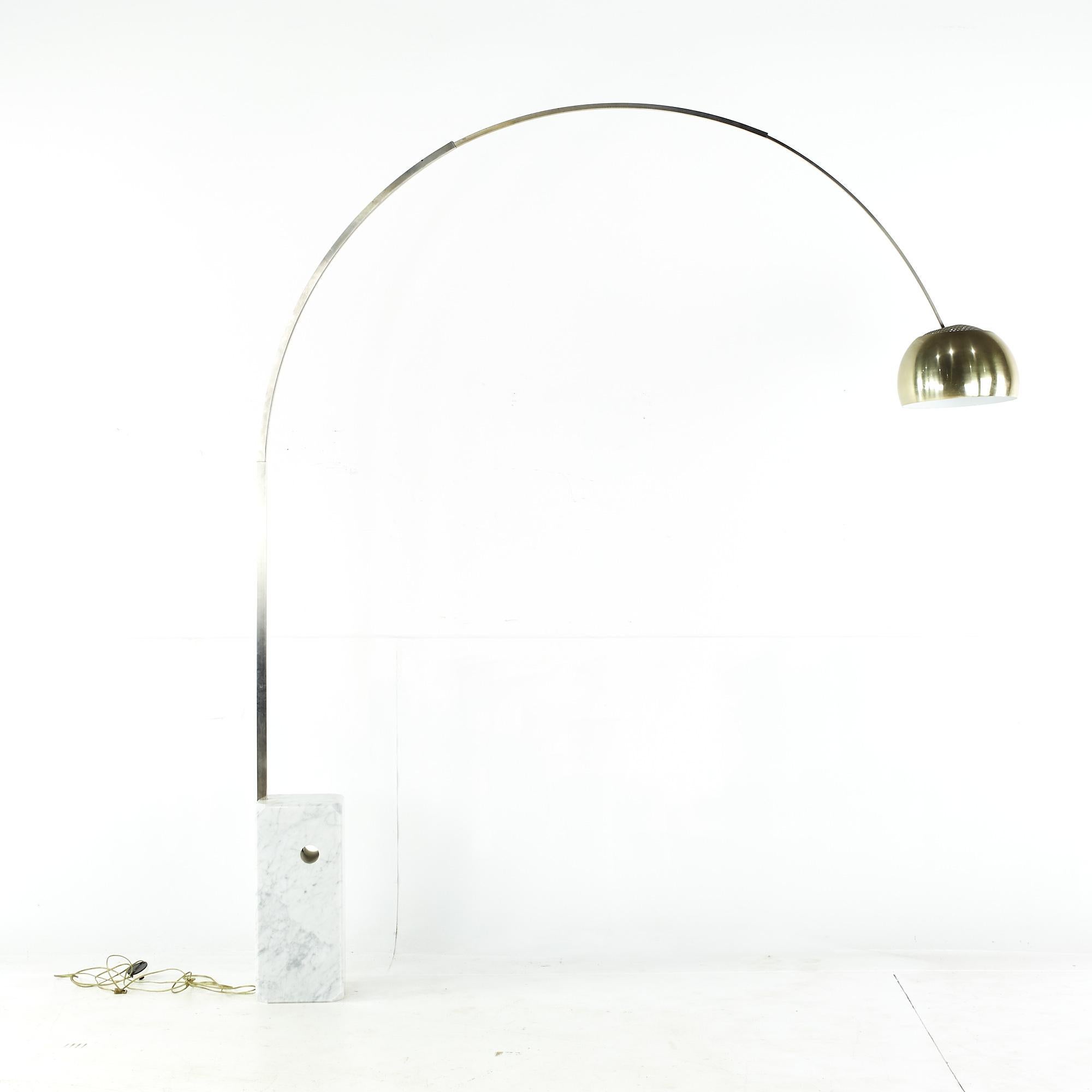 Arco mid-century brass and marble floor lamp.

This floor lamp measures: 82 wide x 12. 5 deep x 97 inches high.

All pieces of furniture can be had in what we call restored vintage condition. That means the piece is restored upon purchase so