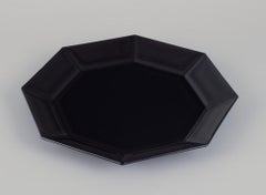 Arcoroc, France. A set of six octagonal plates in black glass.