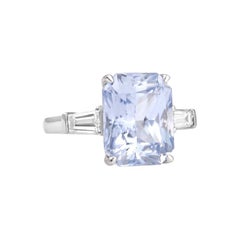 Arctic Ice Blue Sapphire Cocktail Ring with Tapered Baguette Side Diamonds