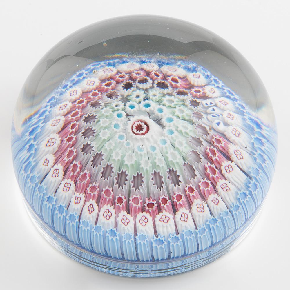 Heading : Arculus Walsh Walsh paperweight – “1848” Old English paperweight Concentric Polychrome Millefiori c1900
Date : c1900
Origin : England
Features : A sic row concentric millefiori paperweight with 1848 signature canes within the set up.
Marks