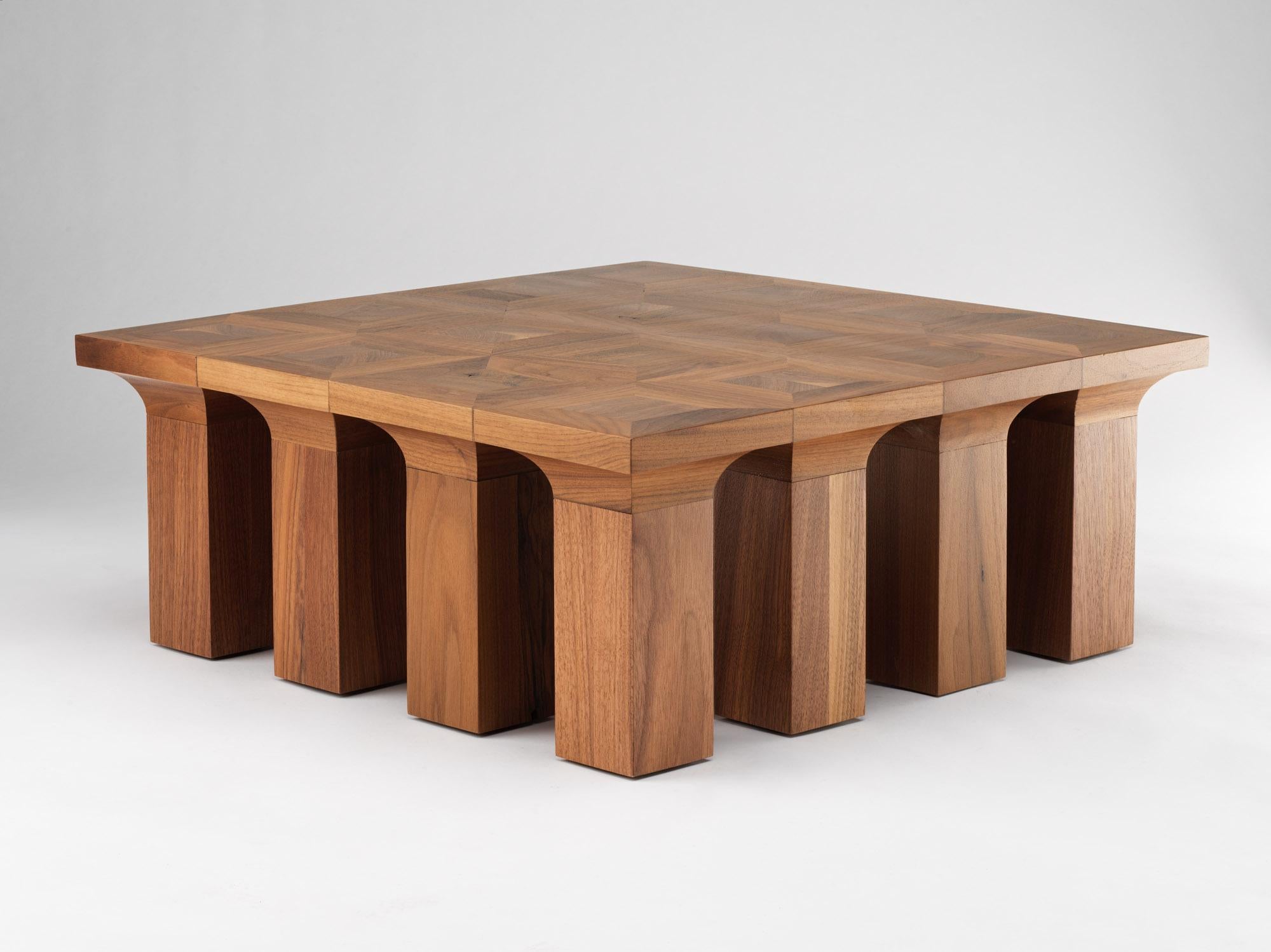 Arcus Coffee Table 60 by Tim Vranken
Limited edition 8 pieces
Materials: American Walnut
Dimensions: 60 x 60 x H 24.5 cm 

Tim Vranken is a Belgian furniture designer who focuses on solid, handmade furniture. Throughout his designs the use of pure